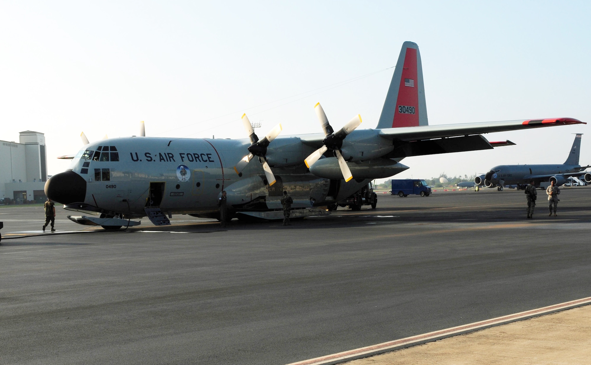 An LC-130 Hercules sits on the flightline Oct. 28 at Hickam Air Force Base, Hawaii, during a stop on its way to Antarctica.  The aircraft and its crew, from the New York Air National Guard’s 109th Airlift Wing at Stratton Air National Guard Base, N.Y., are travelling to Antarctica to support Operation Deep Freeze, the Department of Defense's logistical support to U.S. research activities at the southernmost continent. (U.S. Air Force photo/Tech. Sgt. Kerry Jackson)