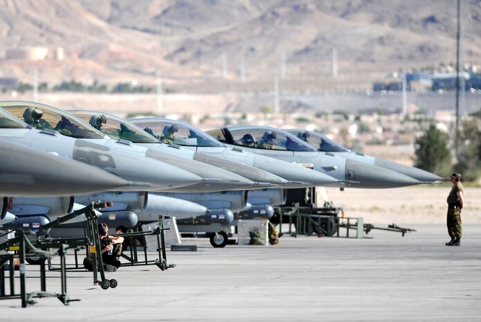 NELLIS AIR FORCE BASE, Nev. --  F-16AM Fighting Falcons from The Royal Netherlands Air Force prepare to taxi out at Red Flag 10-1, Oct. 22, 2009. Red Flag is a realistic combat training exercise involving the air forces of the United States and its allies. The exercise is conducted on the 15,000-square-mile Nevada Test and Training Range, north of Las Vegas. (U.S. Air Force photo by Airman 1st Class Brett Clashman)(Released)