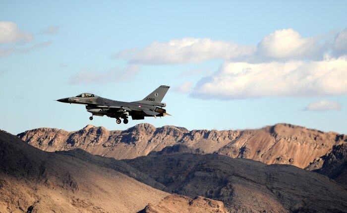 NELLIS AIR FORCE BASE, Nev. -- A F-16AM Fighting Falcon from The Royal Netherlands Air Force prepares to land at Red Flag 10-1, Oct. 20, 2009. Red Flag is a realistic combat training exercise involving the air forces of the United States and its allies. The exercise is conducted on the 15,000-square-mile Nevada Test and Training Range, north of Las Vegas. (U.S. Air Force photo by Airman 1st Class Brett Clashman)(Released)