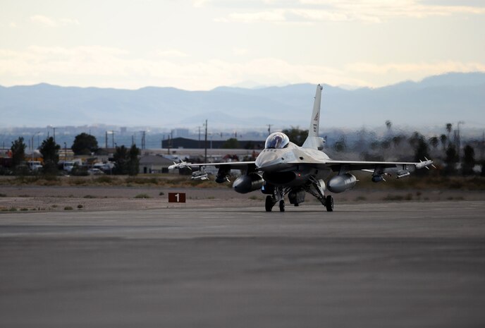 NELLIS AIR FORCE BASE, Nev. -- A F-16AM Fighting Falcon from The Royal Norwegian Air Force, taxi's out at Red Flag 10-1, Oct. 20, 2009. Red Flag is a realistic combat training exercise involving the air forces of the United States and its allies. The exercise is conducted on the 15,000-square-mile Nevada Test and Training Range, north of Las Vegas. (U.S. Air Force photo by Airman 1st Class Brett Clashman)(Released)