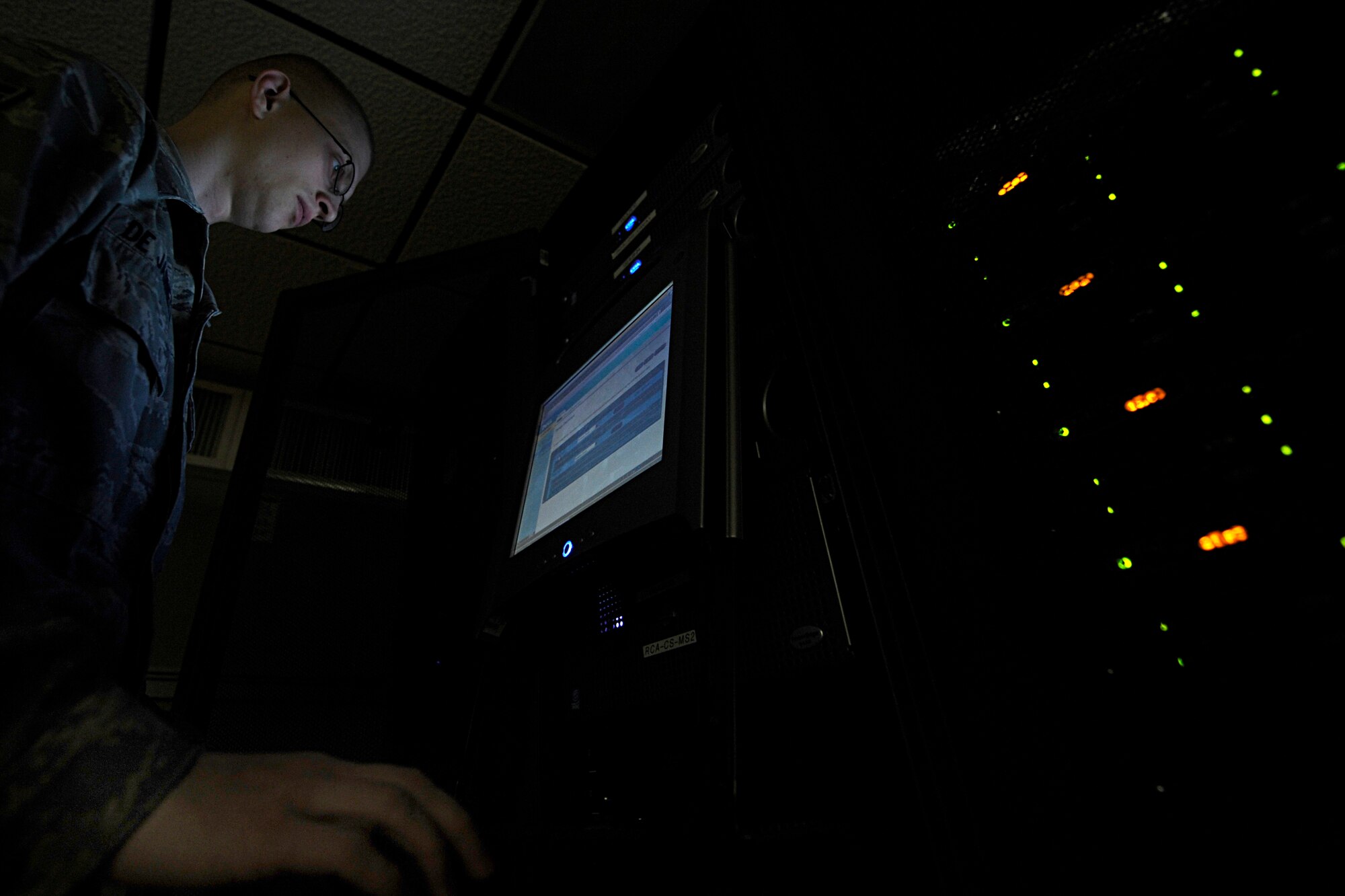 Airman 1st Class Paul DeJarnette, 28th Communications Squadron network control center technician, checks logs and runs a system scan here, Oct. 27. Airman DeJarnette scans the servers to ensure network integrity. (U.S. Air Force photo/Airman 1st Class Matthew Flynn)
