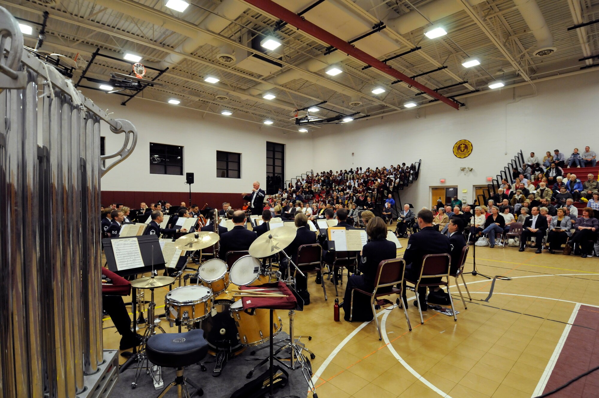 The United States Air Force Band performs at Bishop McNamara High School Oct. 27 in Forestville, Md. The Band performed several musical pieces during the two-hour concert for more than 200 students and parents. The largest musical ensemble of The United States Air Force Band is the Concert Band. Performing regularly for the general public in the greater Washington, D.C., area and on biannual community relations tours throughout the United States, The Air Force Concert Band is also in constant demand by many of the world's most highly respected professional musical organizations. The Concert Band is proud to represent the United States as a component of The United States Air Force Band, "America's International Musical Ambassadors." (U.S. Air Force photo by Staff Sgt. Tim Chacon)