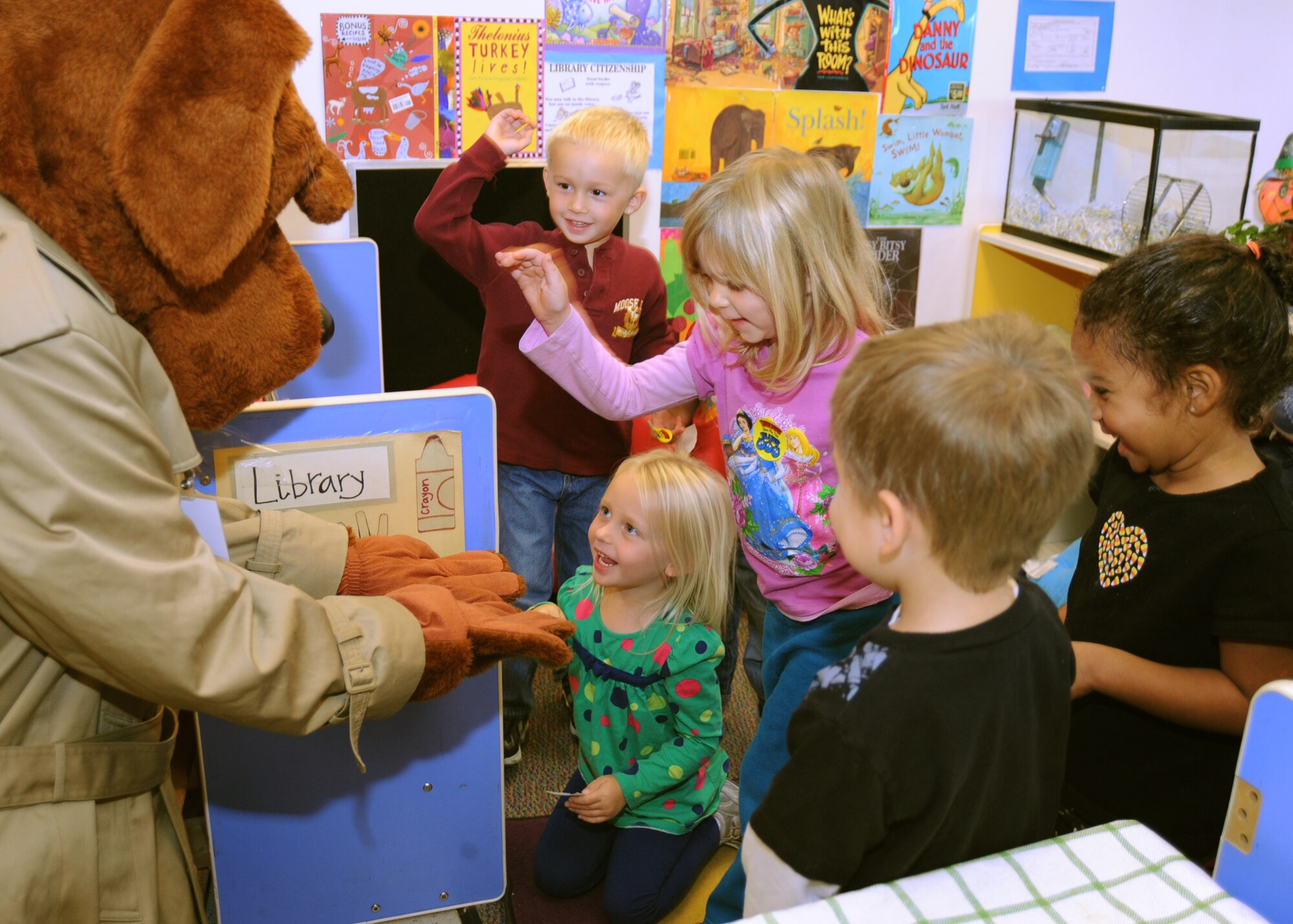 McGruff the Crime Dog talks to children at the McConnell Air Force Base, Kan., Child Development Center about preventing drug and alcohol use, Oct. 27, 2009, during National Red Ribbon Week. This year’s campaign is “Drug free is the key.” DOD has officially participated in Red Ribbon Week since 1990. (U.S. Air Force Photo/Airman 1st Class Ruiz)
