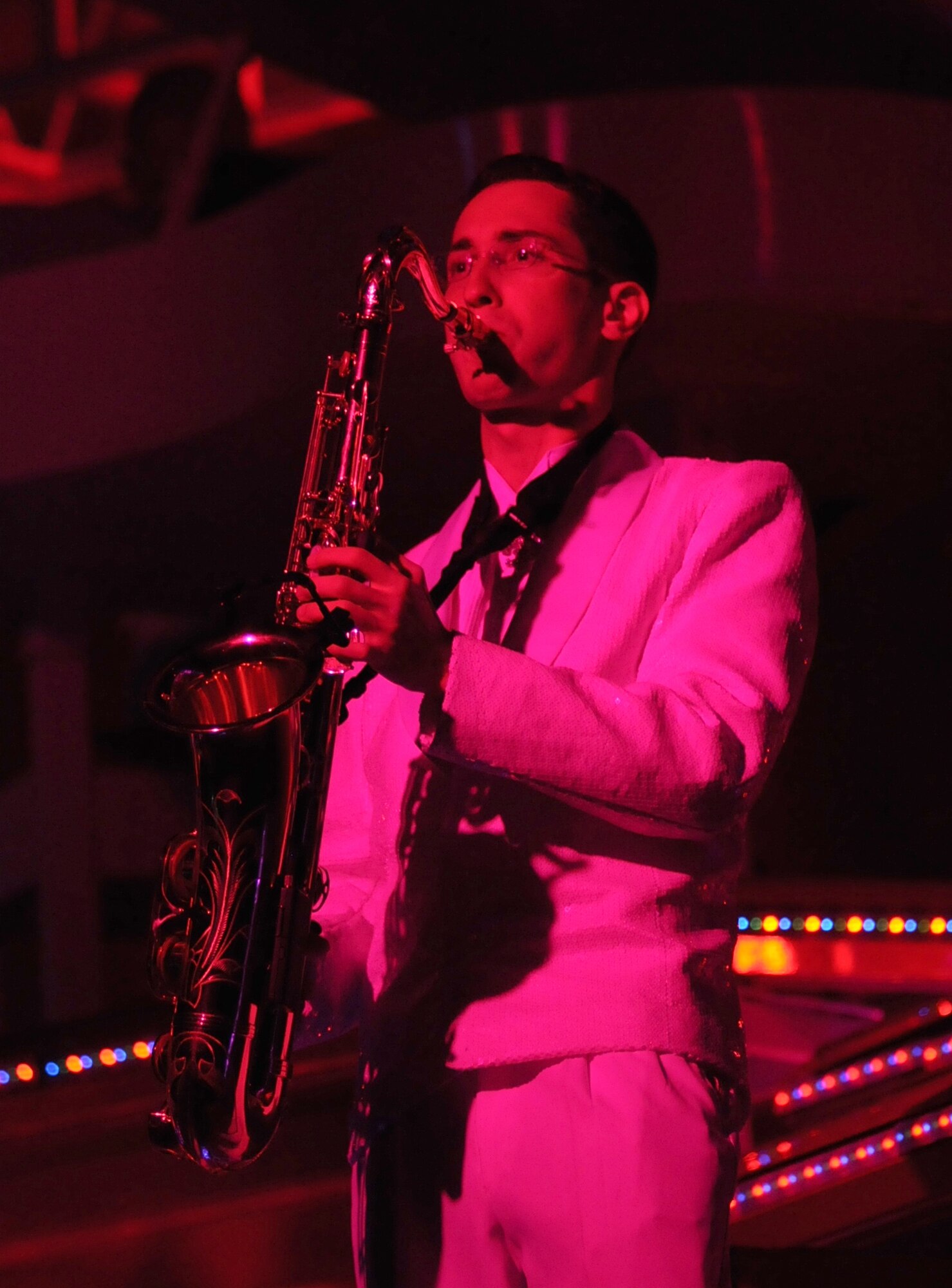 Airman 1st Class Simon Lahn, RAF Mildenhall, England, plays a tune on his saxophone at Sunday’s Tops in Blue show at the Mississippi Coast Coliseum in Biloxi.  The theme for the current Tops in Blue world tour is “To Dream.” (U.S. Air Force photo by Kemberly Groue)