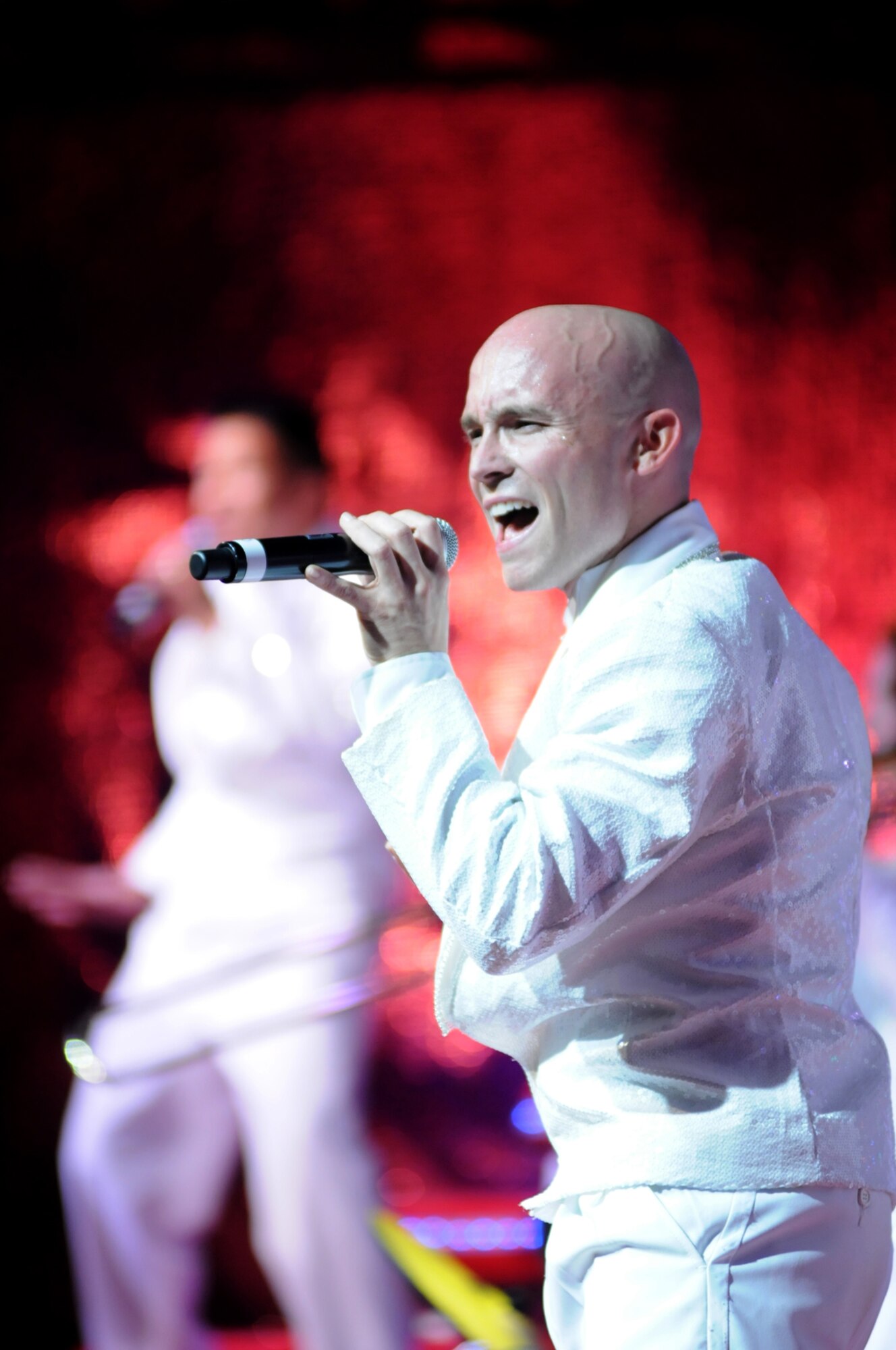 Senior Airman Jeffrey Collins, McGuire AFB, N.J., performs at Sunday’s Tops in Blue show at the Mississippi Coast Coliseum in Biloxi.  The theme for the current Tops in Blue world tour is “To Dream.” (U.S. Air Force photo by Kemberly Groue)