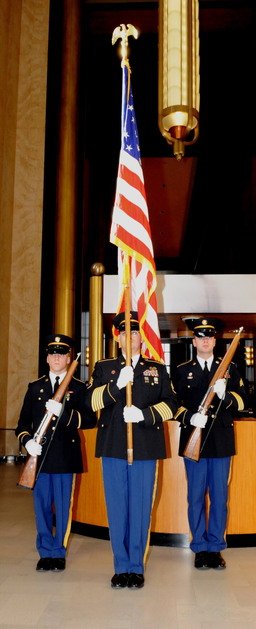 BISMARCK, N.D.  -- Members of the North Dakota National Guard present the colors at the Day of the Deployed ceremony here, Oct. 26. The 4th annual Day of the Deployed ceremony is part of an active way to support our brothers in arms who are sent overseas in order to protect the freedoms of America and her allies. (U.S. Air Force photo by Senior Airman Michael Veloz)