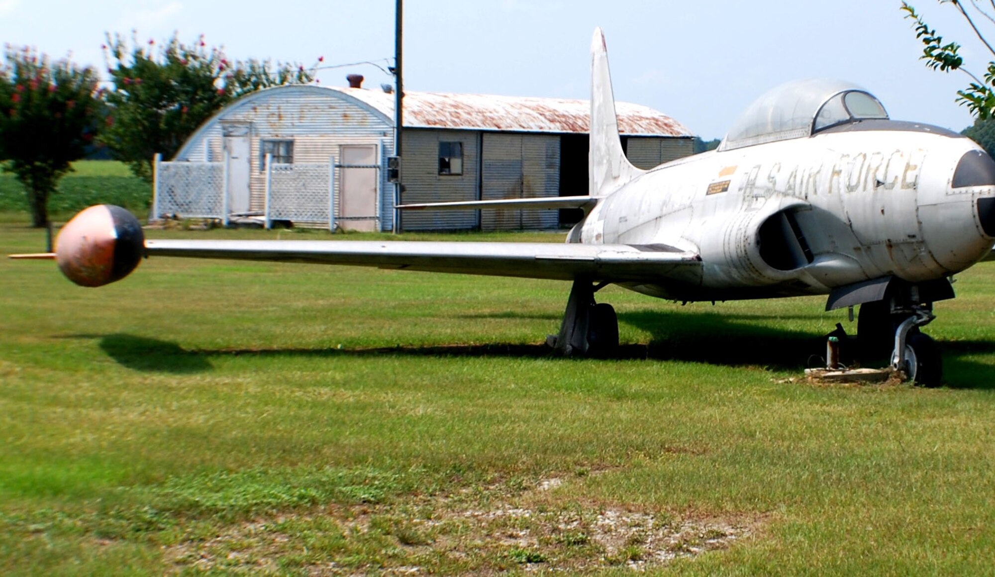 DARLINGTON, S.C -- A Lockheed T-33 Shooting Star, also known as a "T-bird," waits at the Darlington County Airport for its make-over, being led by Boy Scout Frankie Slemmer as an Eagle Scout project. The T-33 once served at Shaw. (Courtesy Photo)