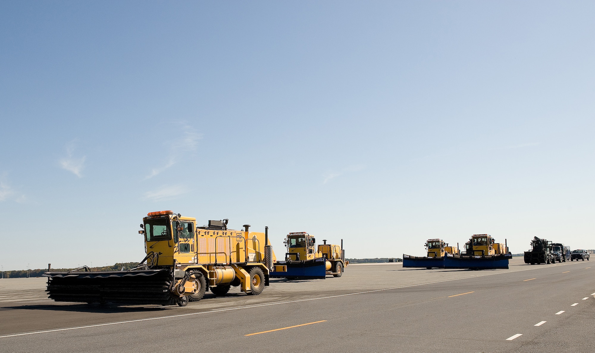 The 436th Civil Engineer Squadron held their annual Snow Plow Parade Oct. 21 to demonstrate snow removal capabilities to base leadership.  (U.S. Air Force photo/Jason Minto)