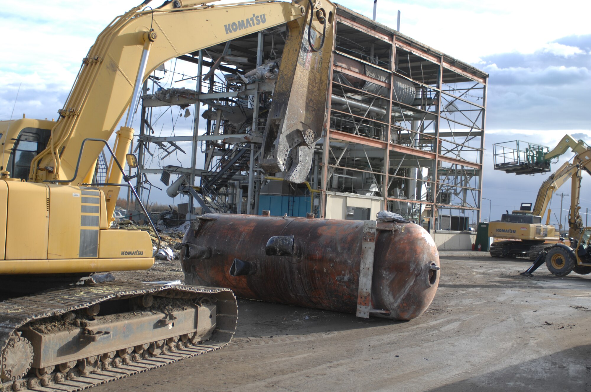 MINOT AIR FORCE BASE, N.D. -- Contractors demolish the heat plant, which served Minot AFB for more than 50 years, here, Oct. 27. The heat plant, built in 1957, first used coal to heat the base, which was later replaced by natural gas lines. Improvements like this are just one of the many ways this base is adhering to energy efficiency standards. (U.S. Air Force photo by Airman 1st Class Aaron-Forrest Wainwright)