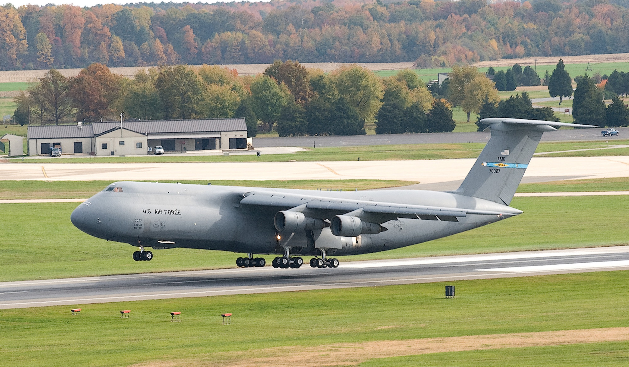 A C-5 Galaxy comes in for a landing at Dover Air Force Base Oct. 26. The C-5 and other aircraft transiting Dover will benefit greatly from the new air traffic control tower here. The new tower includes better equipment, making the air space around Dover safer and easier to traverse. (U.S. Air Force photo/Jason Minto)
