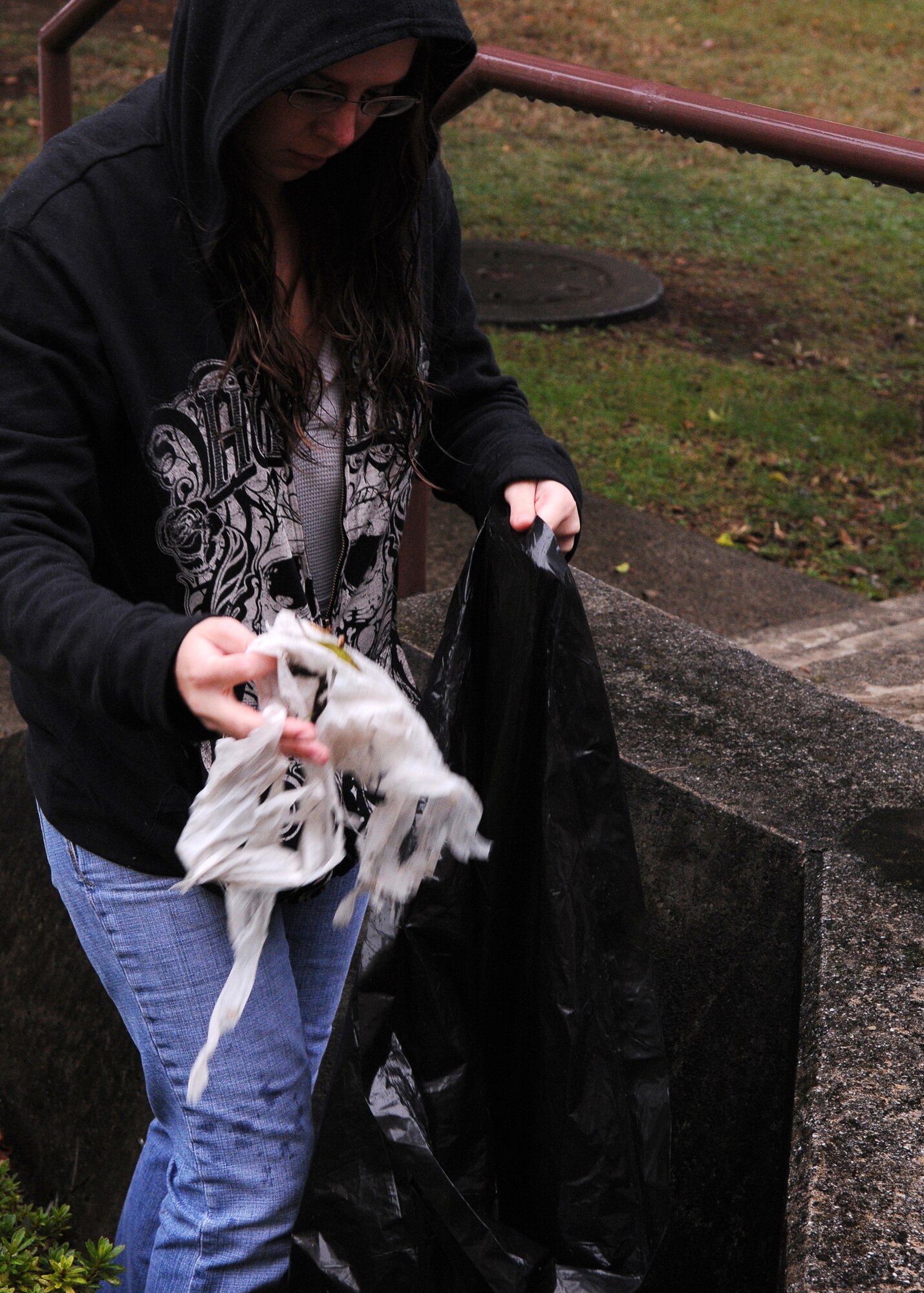YOKOTA AIR BASE, Japan -- Airman 1st Class Mary Simpson, 374th Maintenance Squadron, participates in Troops for Trash near Yuko Park on the base's east side Oct. 25. (U.S. Air Force photo/Airman 1st Class Michael Dillon)