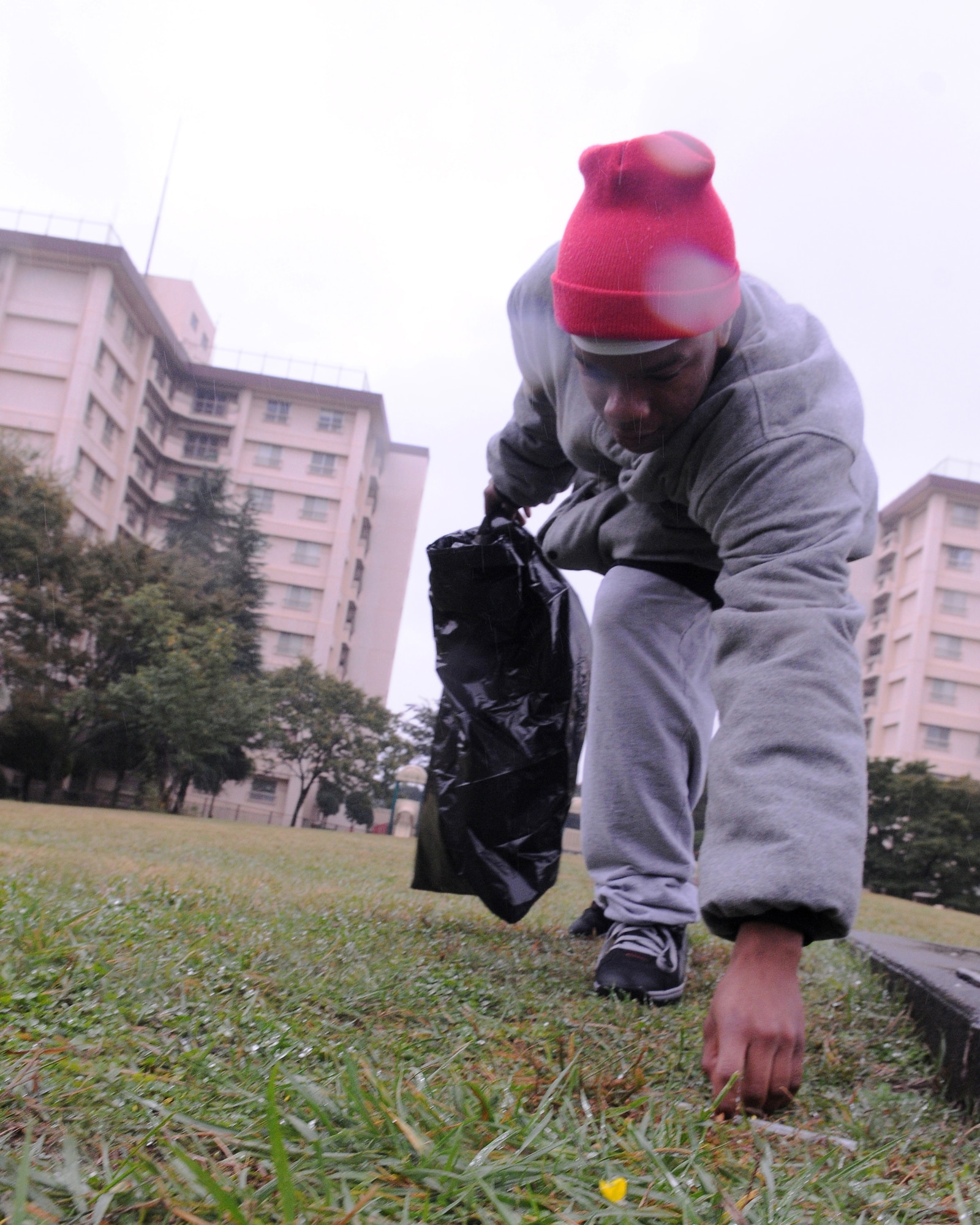 YOKOTA AIR BASE, Japan -- Airman 1st Class Sean Walker, 374th Force Support Squadron, participates in Troops for Trash at Yuko Park on the base's east side Oct. 25.(U.S. Air Force photo/Airman 1st Class Michael Dillon)