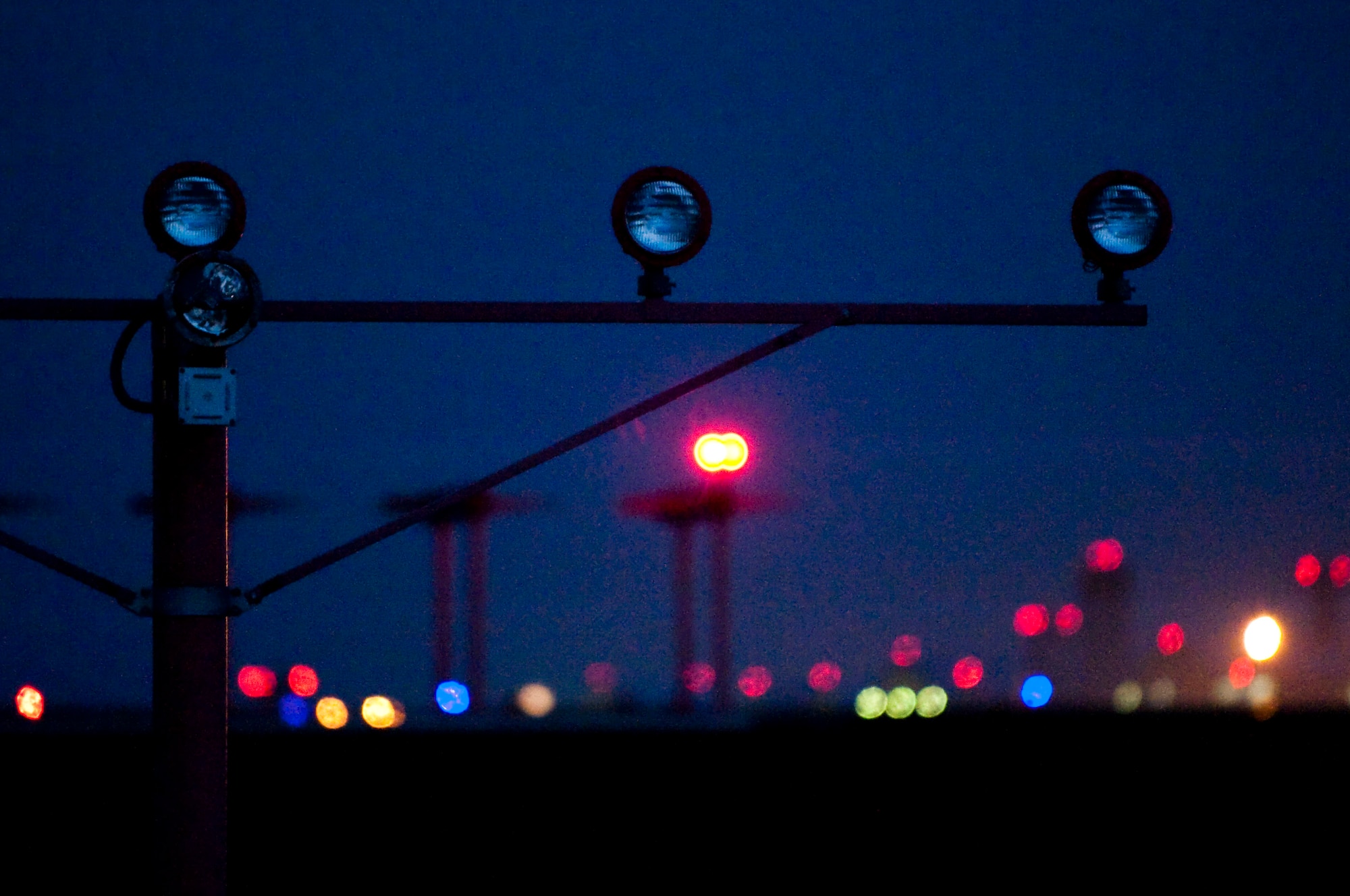 MISAWA AIR BASE, Japan – Runway approach lights on the airfield are turned off as night approaches Oct. 27, 2009. By turning the airfield lights off after the last aircraft lands at night, Misawa AB is able to save more than $56,000 annually in energy costs. (U.S. Air Force photo/Staff Sgt. Samuel Morse) 

