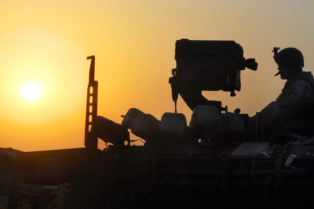 U.S. Army Sgt. Zachary Sherman continues an overnight watch during Yudh Abyas on Camp Bundela, India, Oct. 22, 2009. Sherman is assigned to the 25th Infantry Division's 2nd Squadron, 14th Cavalry Regiment, 2nd Stryker Brigade Combat Team.