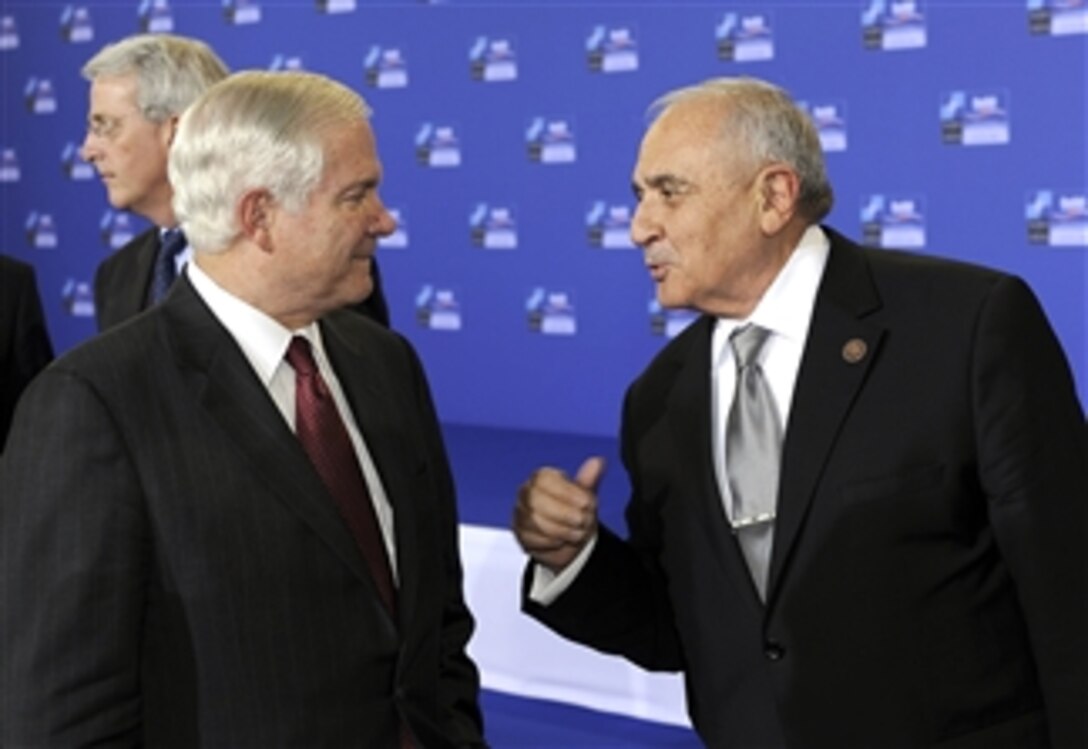Secretary of Defense Robert M. Gates talks with Turkish Minister of Defense Vecdi Gonul during a NATO defense ministers meeting in Bratislava, Slovakia, on Oct. 23, 2009.  