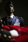Air Force Lt. Col. Nathaniel Ward, C-17 pilot, 732 Airlift Squadron, McGuire Air Force Base, waits with the American Flag inside Yankee Stadium. The Snow Hill, Md., native was part of the Marine, soldier, sailor, airmen and West Point cadet detail that unfurled an American Flag before the first game of the World Series, Oct. 28.  The ceremony honored military veterans.(Official Marine Corps photo by Sgt. Randall A. Clinton)