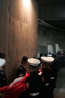 Marines, sailors, airmen, soldiers and West Point cadets wait with an outfield-sized American Flag before the first game of the World Series at Yankee Stadium, N.Y., Oct. 28. Service members unfurled a flag across the outfield and wounded warriors joined a United States Military Academy at West Point color guard as part of a ceremony honoring military veterans. (Official Marine Corps photo by Sgt. Randall A. Clinton)