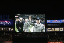 Gen. George W. Casey Jr., Chief of Staff for the U.S. Army, acknowledges the crowd during an on field celebration honoring military veterans during the 7th inning stretch of the first game of the World Series Oct. 28, New York. (Official Marine Corps photo by Sgt. Randall A. Clinton)