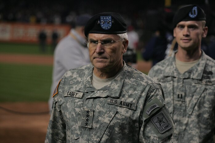 Gen. George W. Casey Jr., Chief of Staff for the U.S. Army, walks off after an on field celebration honoring military veterans during the 7th inning stretch of the first game of the World Series Oct. 28, New York. (Official Marine Corps photo by Sgt. Randall A. Clinton)