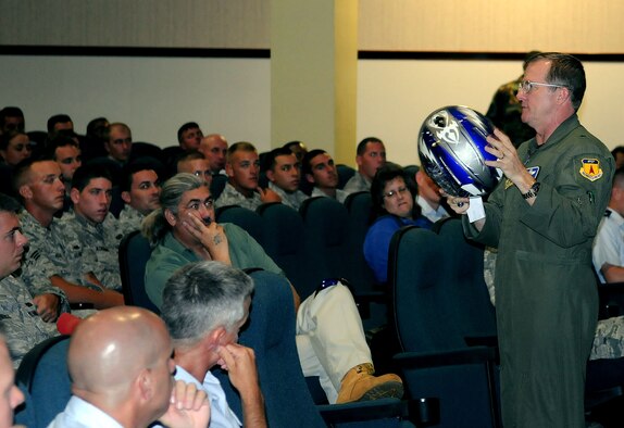 ANDERSEN AIR FORCE BASE, Guam - Brig. Gen. Phil Ruhlman, 36th Wing commander, briefs motorcycle safety during an all call here Oct. 26. The meeting was mandatory for military and open for civilians. It highlighted many issues concerning motorcycle safety, including the rules and regulations regarding the operation of a motorcycle. (U.S. Air Force photo by Airman 1st Class Julian North)