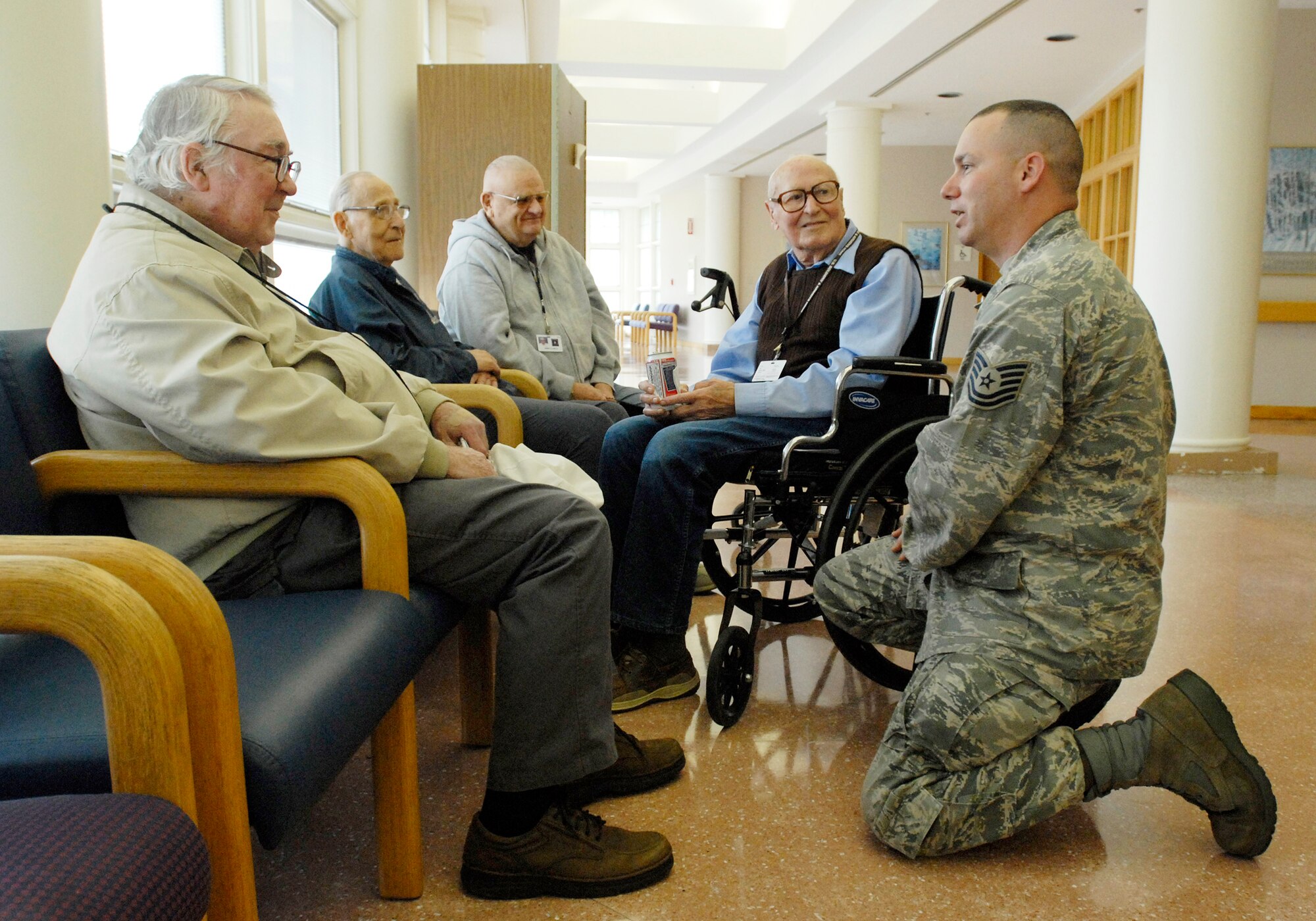 Tech. Sgt. Chris Orbits chats with residents Oct. 16, 2009, during a visit to the U.S. Soldier's and Airmen's Home in Washington, D.C. Sergeant Orbits made the visit with the National Capital Region Joint Enlisted Council. (U.S. Air Force photo/Master Sgt. Stan Parker) 




