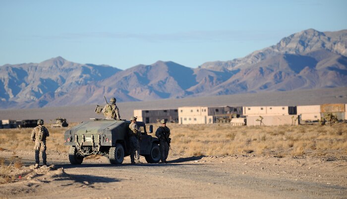 NEVADA TEST and TRAINING RANGE, Nev. -- U.S. Army Special Forces Soldiers guard the perimeter to ensure security during a training exercise at the Urban Operations Center on the Nevada Test and Training Range, Oct. 21, 2009. Special Forces Units from all branches of service and allied nations use the facilities on the NTTR for a multitude of different training. (U.S. Air Force photo by Airman 1st Class Brett Clashman/Released)