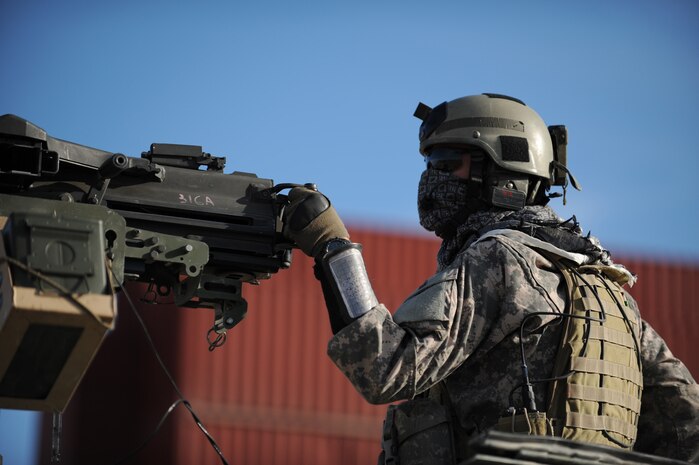 NEVADA TEST and TRAINING RANGE, Nev. -- A U.S. Army Special Forces Soldier guards the perimeter to ensure security at the Urban Operations Center on the Nevada Test and Training Range, Oct. 21, 2009. Special Forces Units from all branches of service and allied nations use the facilities on the NTTR for a multitude of different training. (U.S. Air Force photo by Airman 1st Class Brett Clashman/Released)