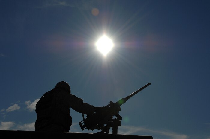 NEVADA TEST and TRAINING RANGE, Nev. -- A U.S. Army Special Forces Soldier scouts the perimeter to ensure security at the Urban Operations Center on the Nevada Test and Training Range, Oct. 21, 2009. Special Forces Units from all branches of service and allied nations use the facilities on the NTTR for a multitude of different training. (U.S. Air Force photo by Airman 1st Class Brett Clashman/Released)