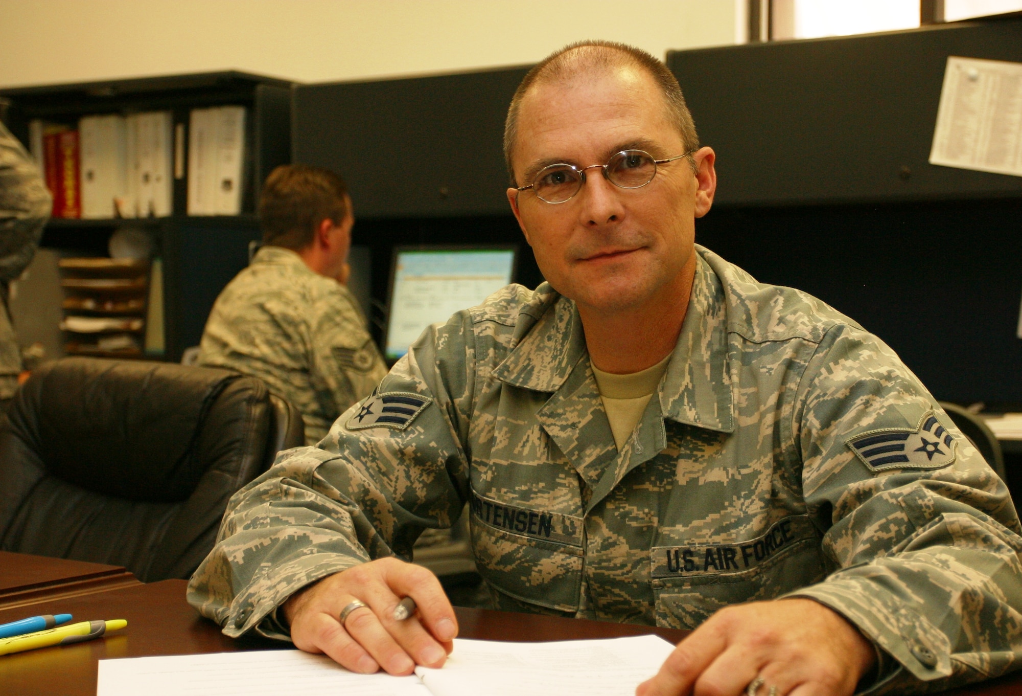 Deep into his books, Senior Airman Byron Mortensen, 419th Logistics Readiness Squadron, studies for his five-level upgrade training. Airman Mortensen recently returned to the 419th after more than 10 years as a civilian. (U.S. Air Force photo/ Senior Airman Brandon Craig)