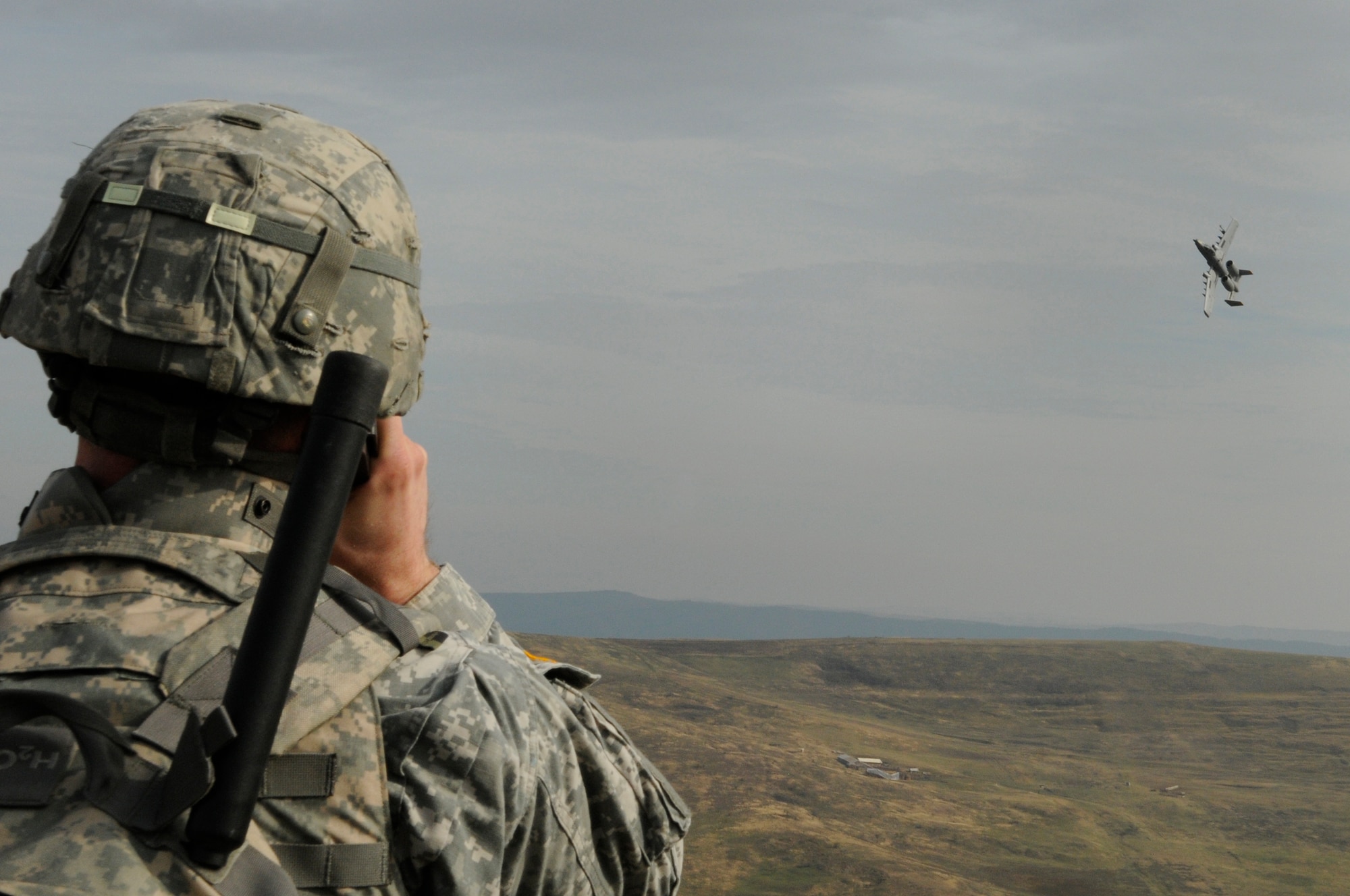 CAPMIA TURZII, Romania – A joint terminal attack controller calls in an A-10 Thunderbolt II for close air support during a training mission for Operation Dacian Thunder 2009 at the 71st Air Base Wing in Romania Oct. 29. During the Operation the U.S. Air Force flew about 100 sorties; half of which were with the Romanian air force. (U.S. Air Force photo/Senior Airman Benjamin Wilson)