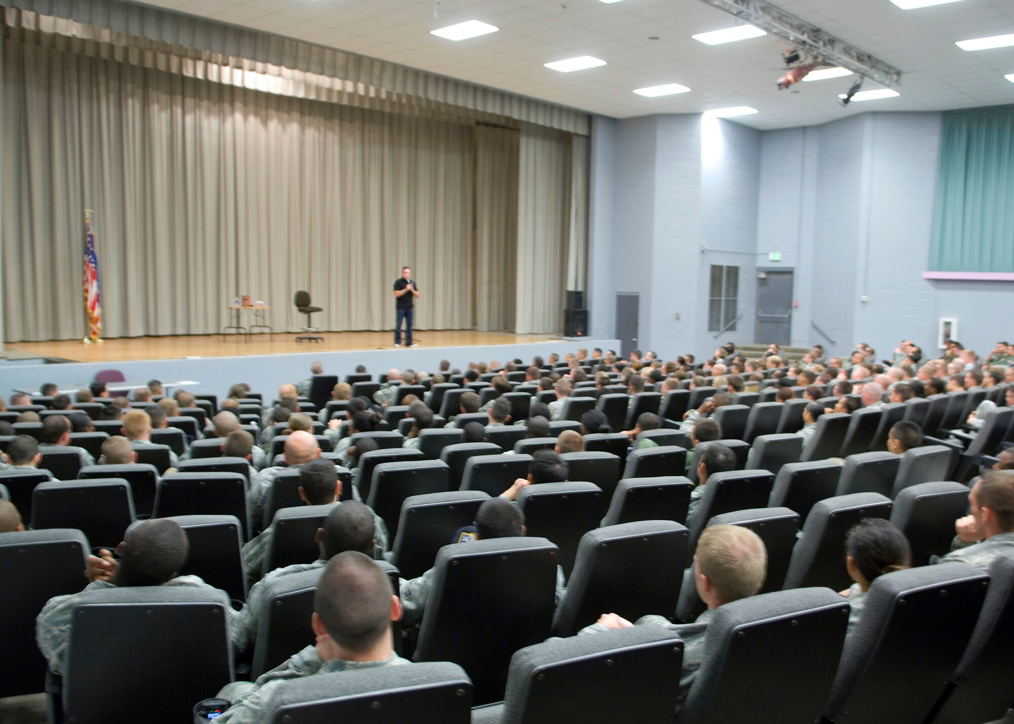 Bernie McGrenahan, Motivational speaker/comedian, performs his stand up routine, which is half comedy show and half alcohol awerness speech intended address the dangers of excessive drinking. Mr. McGrenahan's show is nationally performed a various venues across the country targeting people age 18-25. (Air Force photo/Heather Anhalt)