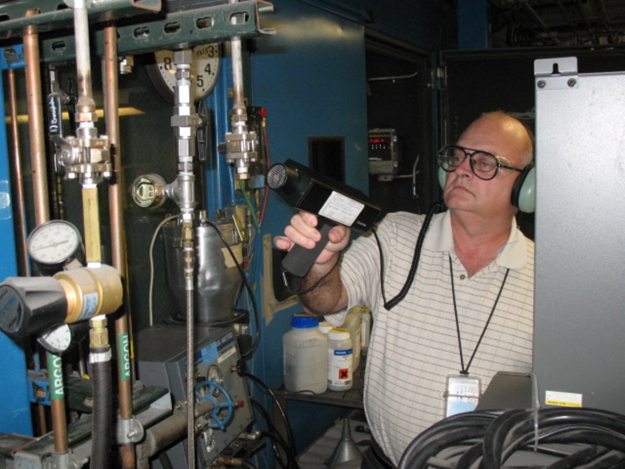Alan Logan, 76th Maintenance Support Squadron Ultrasonic technician, is locating leaks in equipment piping with an ultrasonic leak detector.(Air Force photo)