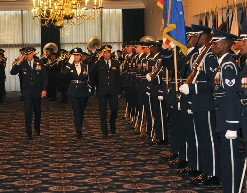 Gen. Norton A. Schwartz, Air Force chief of staff, and Maj. Gen. Ng Chee Khern, Republic of Singapore air force chief, inspect the United States Air Force Honor Guard during an arrival ceremony in honor of the visiting general Oct. 27 in the Bolling Club on Bolling Air Force Base.  So far this year, the Honor Guard has participated in 15 full honors arrival ceremonies welcoming Air Force chief of staff counterparts from multiple countries around the world. (U.S. Air Force photo by Senior Airman Sean Adams)
