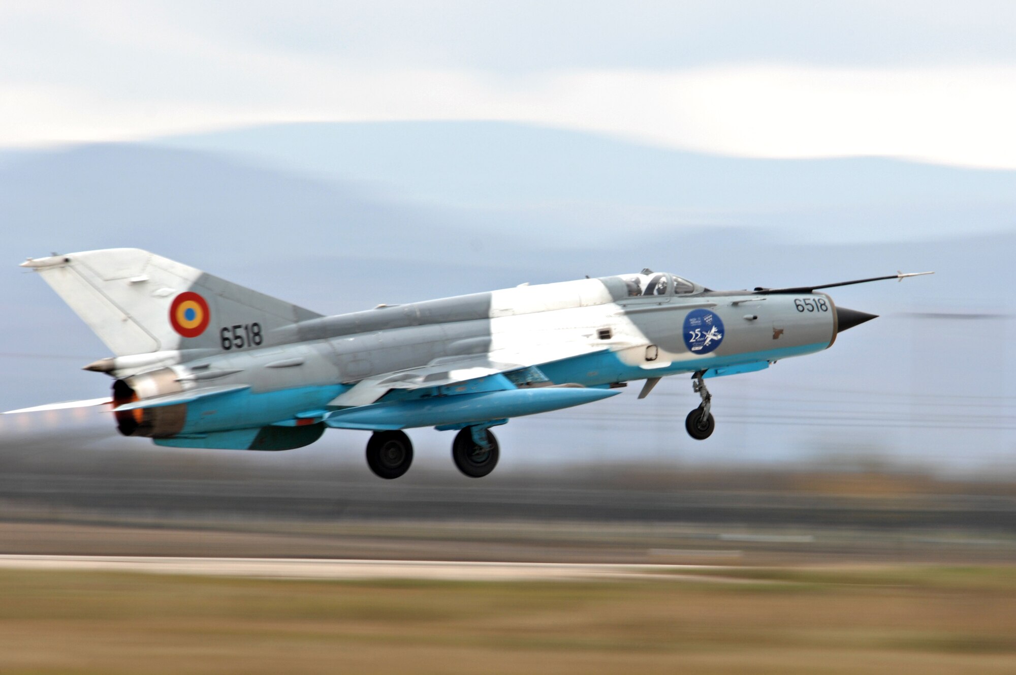 CAMPI TURZII, Romania – A MIG 21 takes off on the runway of the 71st Air Base Wing, in Romania, during an aerial demonstration as part of Operation Dacian Thunder 2009, Oct. 26. During the operation the U.S. Air Force flew about 100 sorties; half of which were with the Romanian air force. (U.S. Air Force photo/Senior Airman Benjamin Wilson).