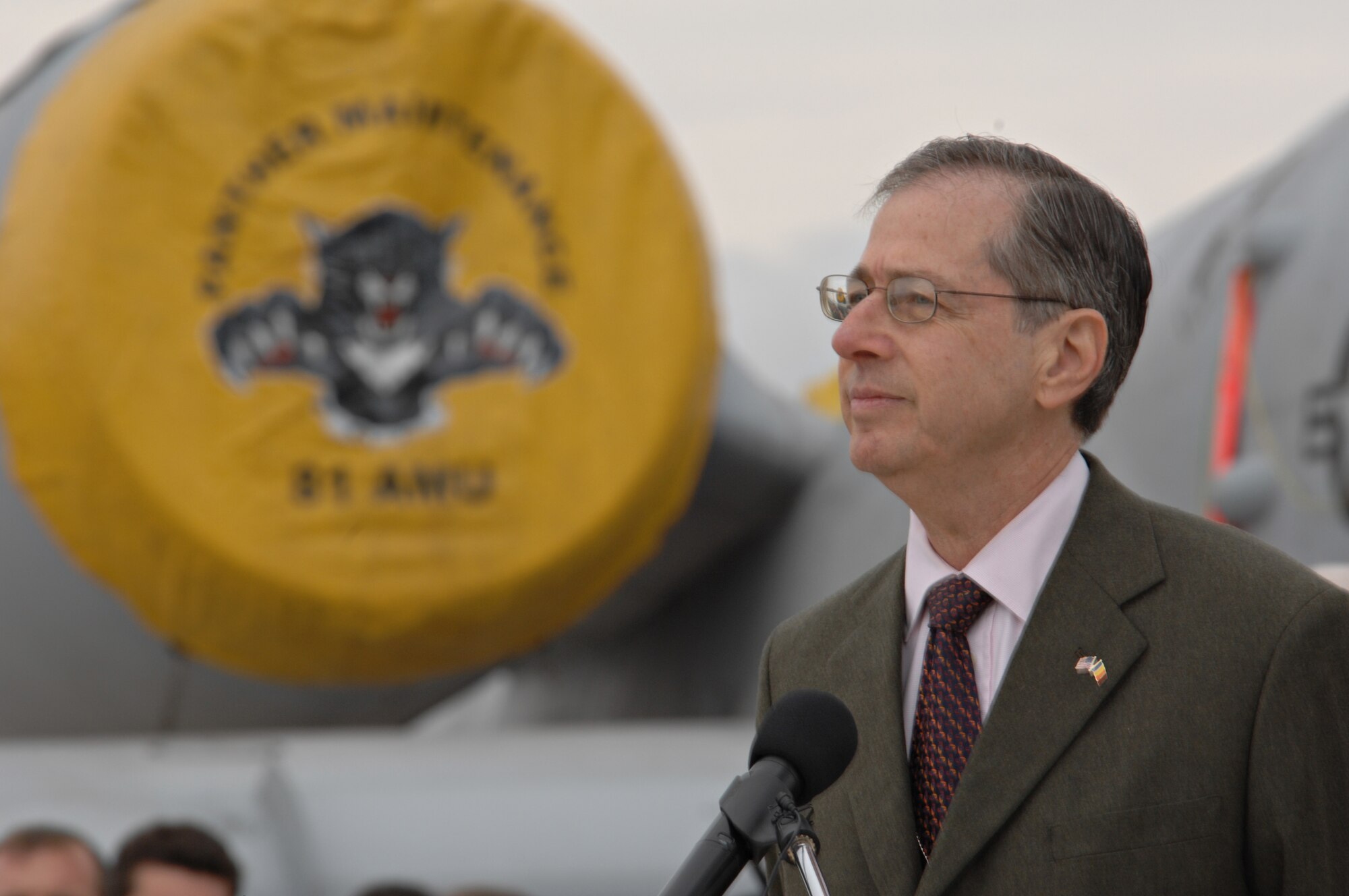 CAMPIA TURZII, Romania – Mark Gitenstein, U.S. Ambassador to Romania, speaks to U.S. and Romanian Airmen, and the Romanian press on the flightline of the 71st ABW in Romania Oct. 28. . Roger Brady, U.S. Air Forces in Europe commander; Ambassador Gitenstein; and Maj. Gen. Ion-Aurel Stancui, Chief of Staff of the Romanian Air Force; visited the base during Operation Dacian Thunder. During the combined training exercise the U.S. Air Force flew about 100 sorties; half of which were flown with the Romanian air force. (U.S. Air Force photo/Senior Airman Benjamin Wilson)