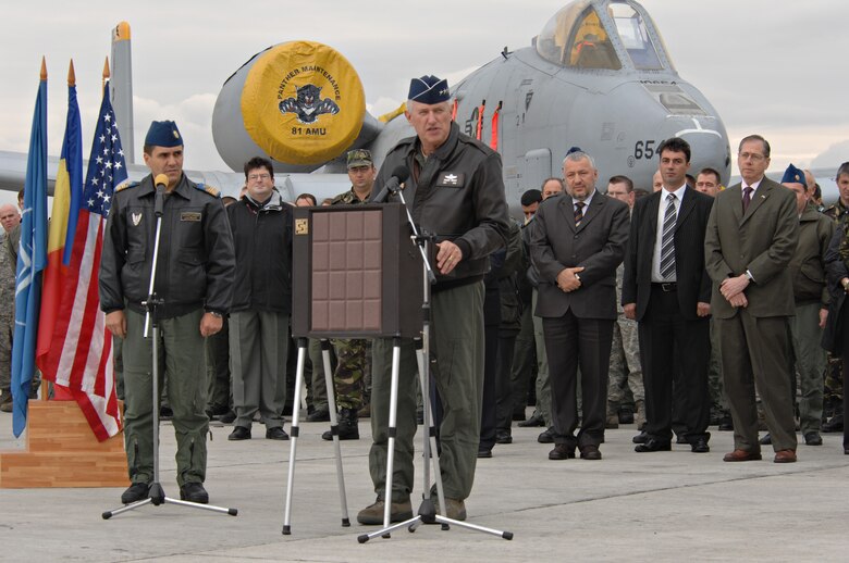 CAMPIA TURZII, Romania – Gen. Roger Brady, U.S. Air Forces in Europe commander, speaks to U.S. and Romanian Airmen, and the Romanian press on the flightline of the 71st ABW in Romania Oct. 28. General Brady; Mark Gitenstein, U.S. Ambassador to Romania; and Maj. Gen. Ion-Aurel Stancui, Chief of Staff of the Romanian Air Force; visited the base during Operation Dacian Thunder. During the combined training exercise the U.S. Air Force flew about 100 sorties; half of which were flown with the Romanian air force. (U.S. Air Force photo/Senior Airman Benjamin Wilson)