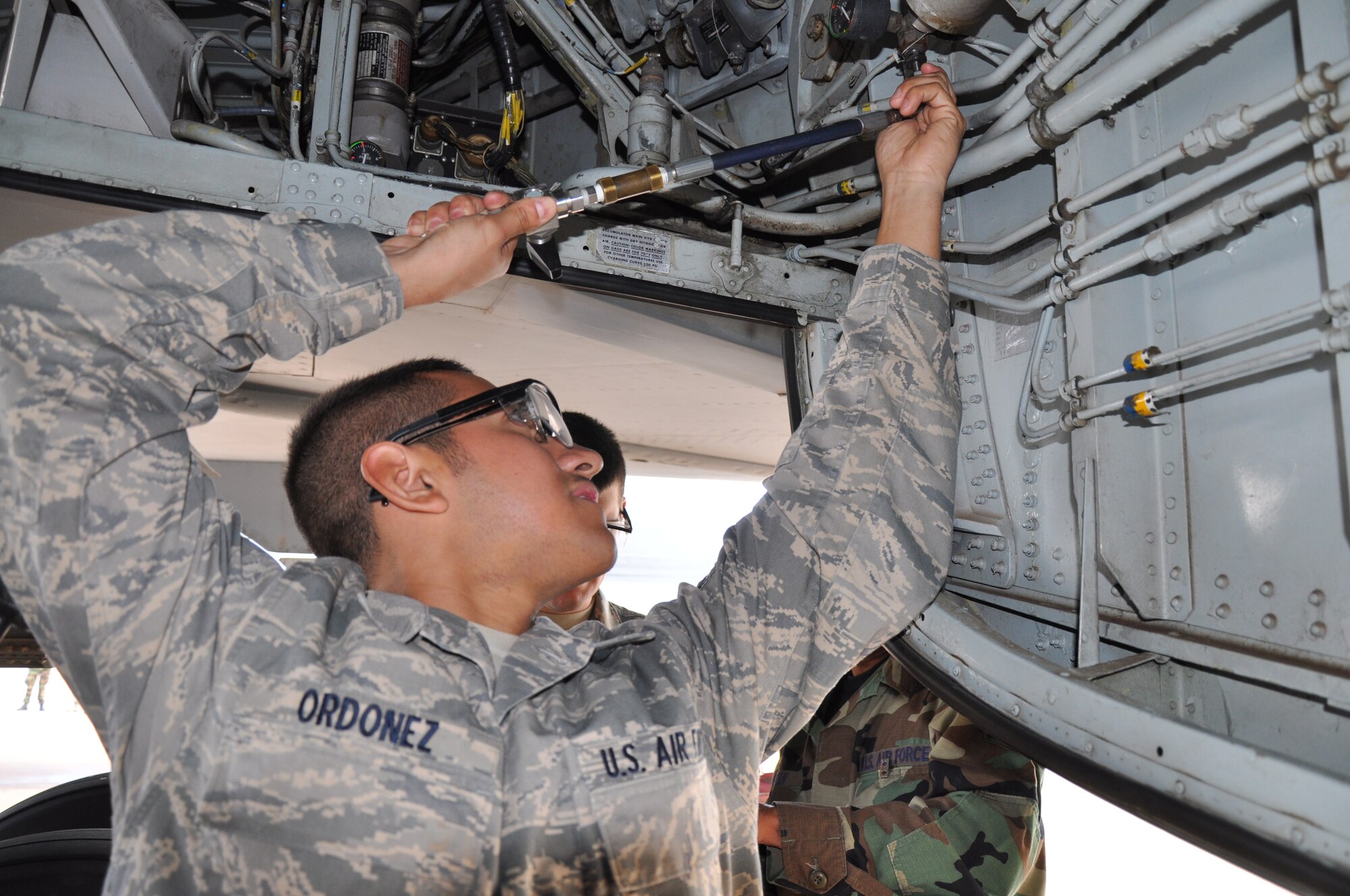 Airman 1st Class Jonathan Ordonez, a KC-135 crew chief student, services the reserve break accumulator on the aircraft. Ensuring heavy aircraft can complete their mission for the Air Force starts at Sheppard in the 362nd Training Squadron's Heavy Training Flight. There are about 500 Airmen in Training at any given time attending Sheppard for heavy crew chief training. (U.S. Air Force photo/Airman 1st Class Candy Miller) 