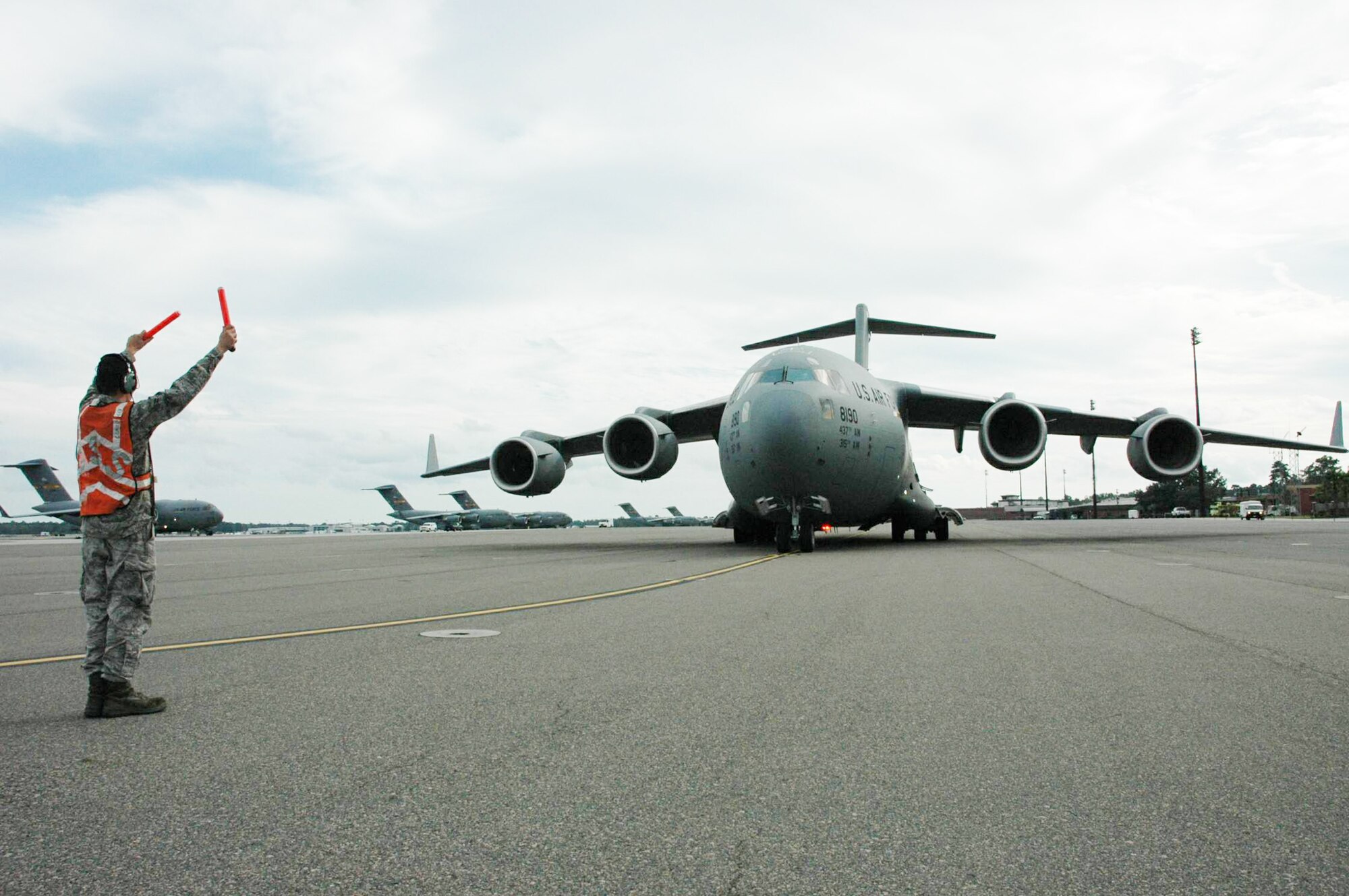 The Air Force's newest C-17 Globemaster III arrives Oct. 28, 2009, at Charleston Air Force Base, S.C. Lt. Gen. Charles E. Stenner Jr., the commander of Air Force Reserve Command, accompanied by an all-Reserve crew from the 317th Airlift Squadron presented a ceremonial key to Col. Steven Chapman, the 315th Airlift Wing commander, on the flightline here, commemorating the Air Force receiving the 190th C-17 and the 58th aircraft at Charleston AFB. (U.S. Air Force photo/Capt. Bryan Lewis) 