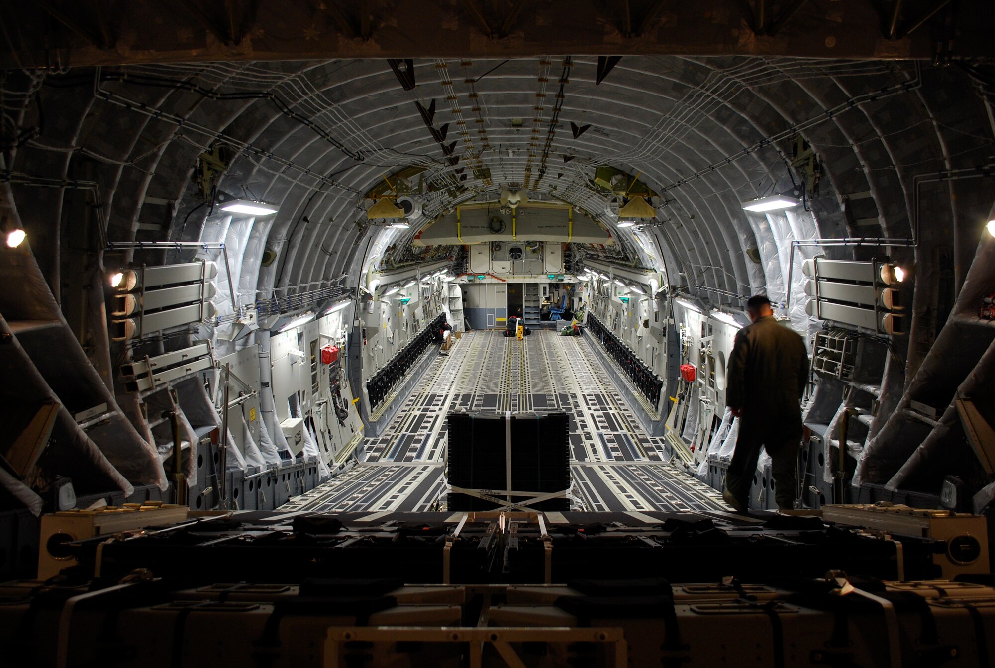 Master Sgt. Michael Lang, 317th Airlift Squadron loadmaster, inspects the inside of the newest C-17 to be delivered at CHarleston AFB, S.C., Oct 28, 2009. Lieutenant General Charles Stenner, commander of Air For Reserve Command, accompanied by an all-Reserve crew from the 317AS, presented a ceremonial key to Col. Steven Chapman, 315th Airlift Wing commander, on the flightline here, commemorating the Air Force’s 190th Globemaster III and Charleston’s 58th. 

