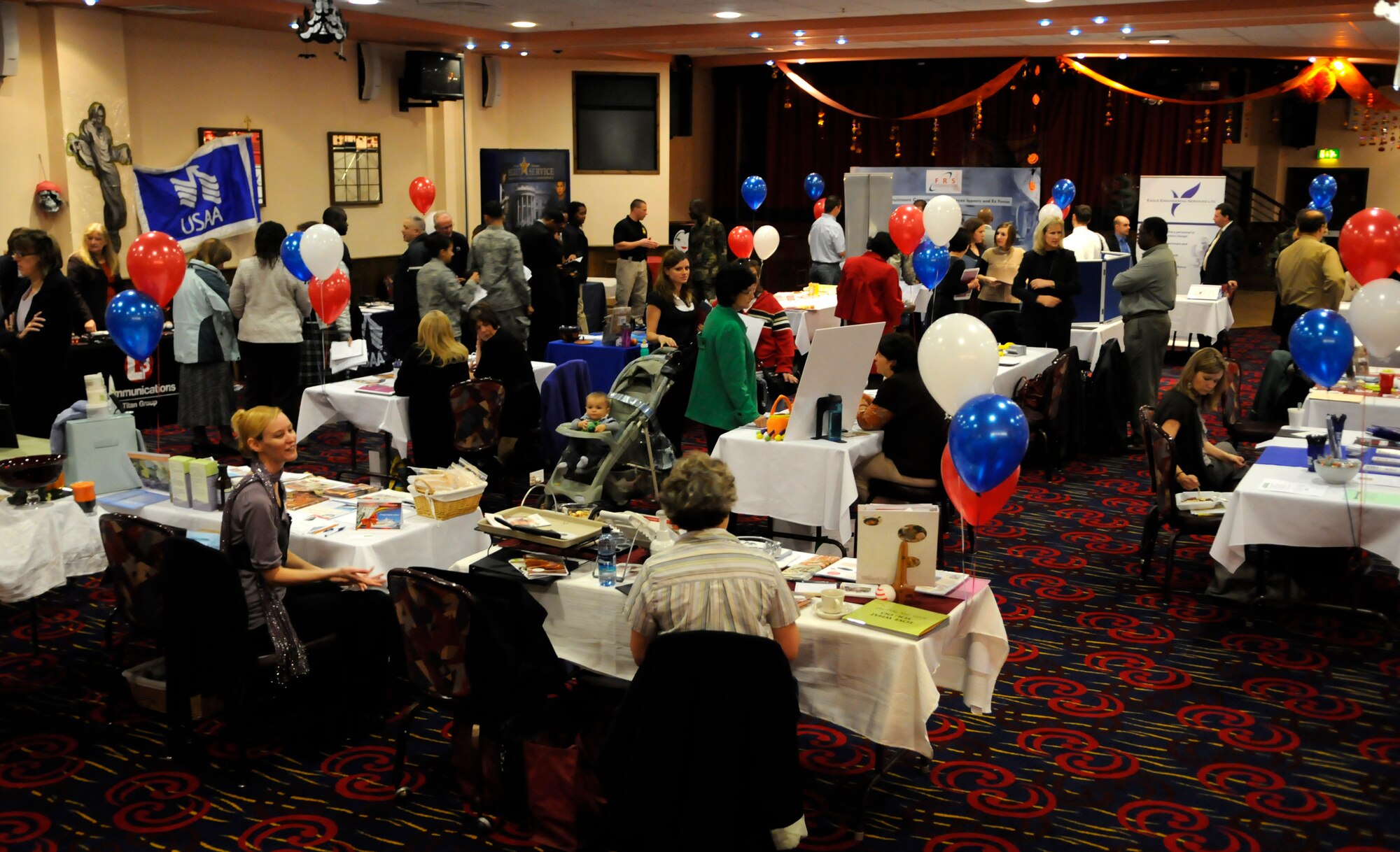 RAF MILDENHALL, England -- A job fair, hosted by the Airman and Family Readiness Center, was held at the Galaxy Club Oct. 29 and featured colleges, banks, the U.S. Secret Service and other job firms.  The fair was designed to help Airmen looking for employment after they’ve completed their term of service.  (U.S. Air Force photo by Staff Sgt. Christopher L. Ingersoll)