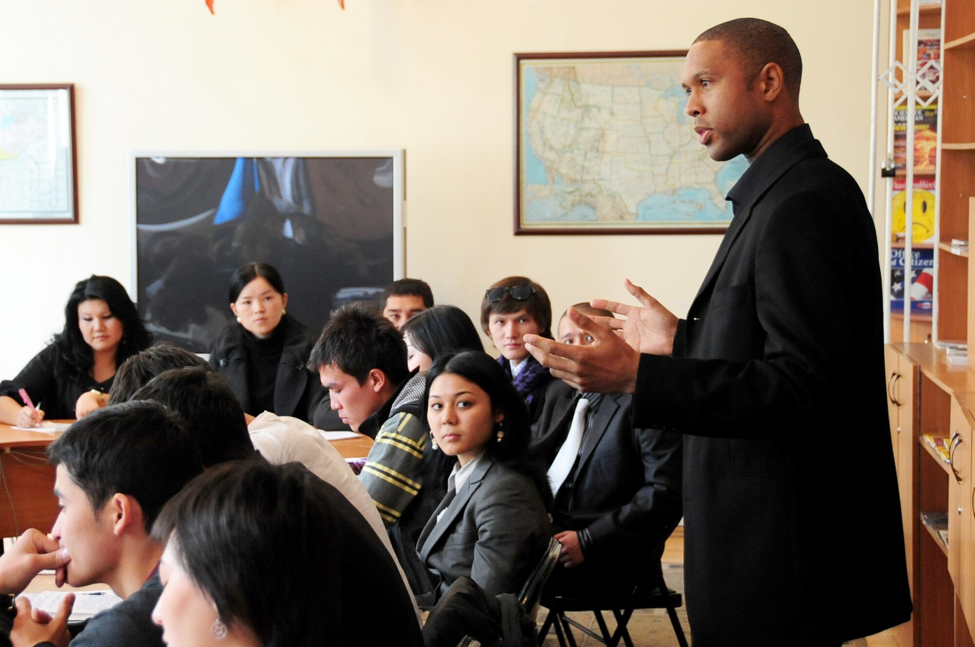 BISHKEK, Kyrgyzstan -- Maj. Rickardo Bodden, 376th Air Expeditionary Wing public affairs officer, speaks to students at the Kyrgyz National University about the Transit Center at Manas? responsibilities, Oct. 27, 2009. Maj. Bodden spoke at two universities in Bishkek about the military missions supporting Operation ENDURING FREEDOM as well as what it takes to be a credible media professional. (U.S. Air Force photo/Senior Airman Steele C. G. Britton)