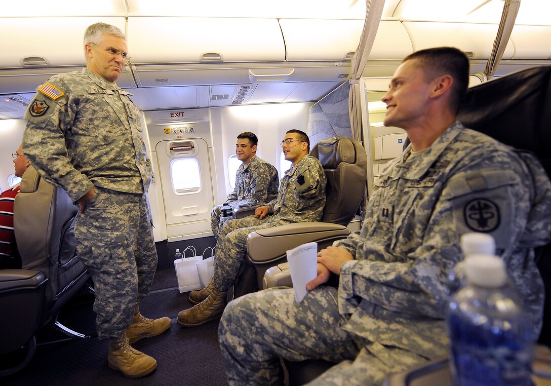 U.S. Army Chief of Staff Gen. George W. Casey Jr. talks with wounded soldiers while en route to Yankee Stadium in New  York, Oct. 28, 2009.  