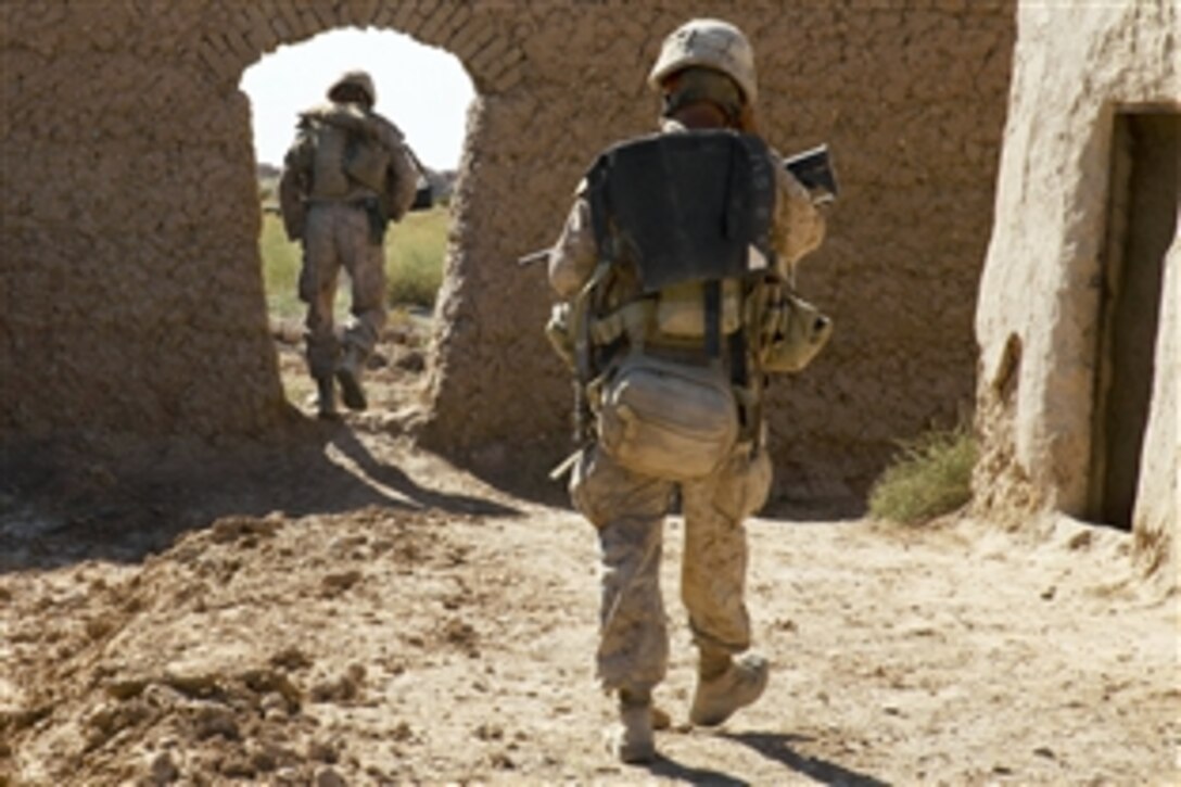 U.S. Marines conduct a security patrol through the Nawa district in Helmand province, Afghanistan, Oct. 20, 2009. The Marines, assigned to Bravo Company, 1st Battalion, 5th Marine Regiment, are conducting security patrols to decrease insurgent activity and gain the trust of the Afghan people.