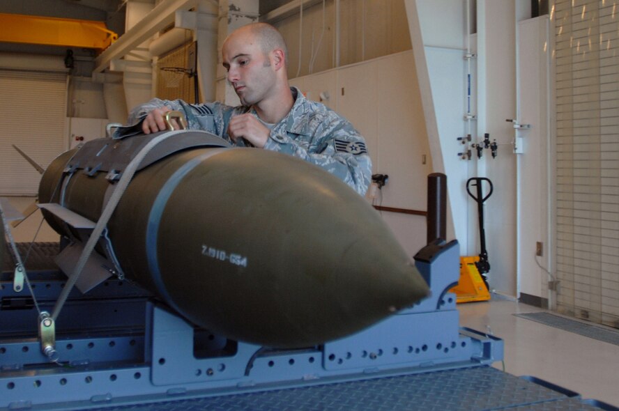 WHITEMAN AIR FORCE BASE, Mo., - Staff Sgt. John Burkhart, 131st Maintenance Squadron conventional maintenance crew chief, performs a post assembly inspection on a pair of GBU 31 weapons, Oct. 23. Sergeant Burkhart and other members of the 131st MXS build and maintain 11 different types of guided weapons. (U.S. Air Force photo/ Senior Airman Kenny Holston)(Released) 