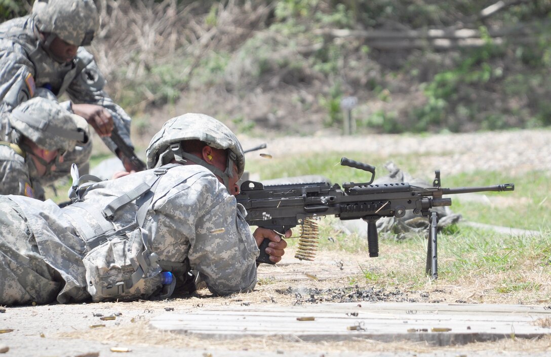 SOTO CANO AIR BASE, Honduras — A Soldier fires a M-249 light machine gun Oct. 28 at the base firing range during the M-249 familiarization portion of a three-day exercise. Soldiers from the 1st Battalion, 228th  Aviation Regiment recently turned their focus from helicopter operations to some basic Soldier field training from Oct. 25 to 29. Some of the things taught during the training were: practicing recall procedures, setting up tents, radio communications, convoy operations, combat medicine, vehicle staging, wrecker operations, M-249 light machine gun familiarization and firing the M-249 at the range (U.S. Air Force photo/Staff Sgt. Chad Thompson).
