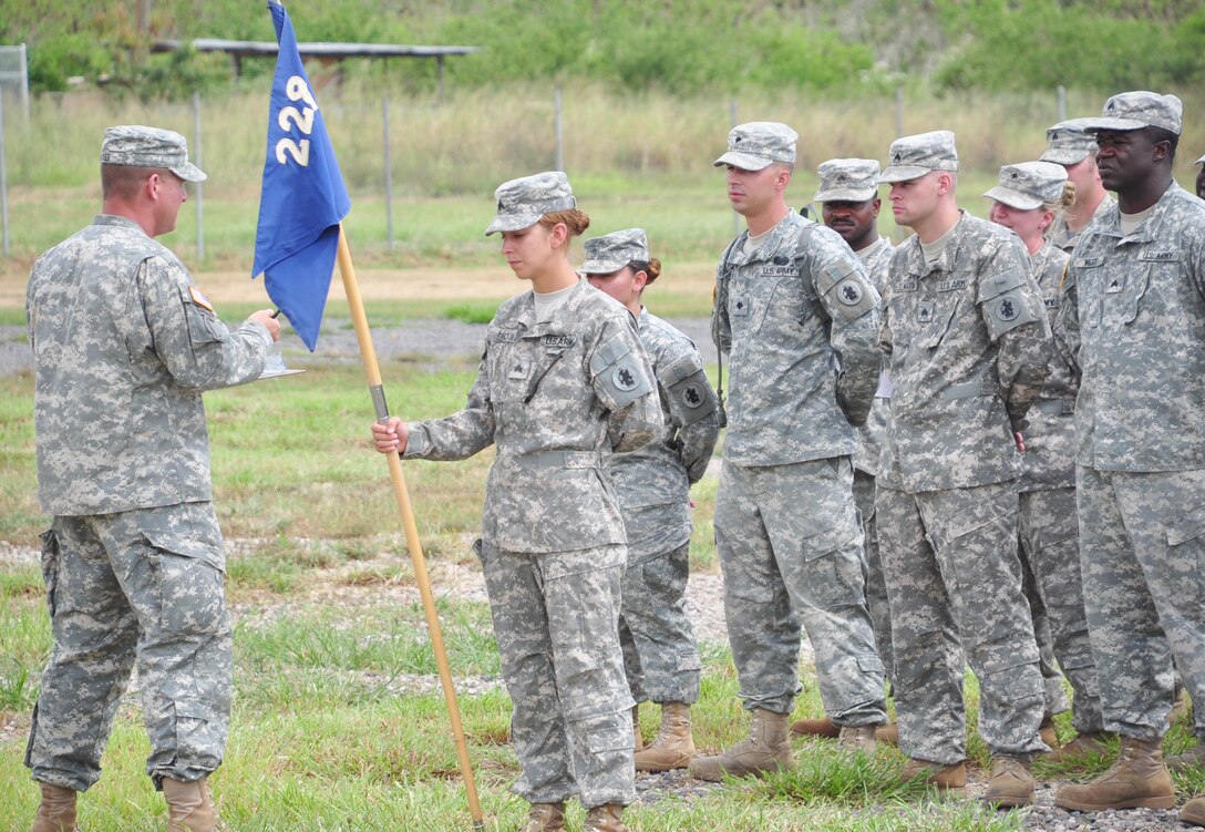 SOTO CANO AIR BASE, Honduras — 1st. Sgt. Mark Baker, 1st Battalion, 228th Aviation Regiment first sergeant, address his Soldiers in a formation Oct. 27 behind the base rappelling station. Soldiers from the 1-228th Aviation Regiment recently turned their focus from helicopter operations to some basic Soldier field training from Oct. 25 to 29. Some of the things taught during the training were: practicing recall procedures, setting up tents, radio communications, convoy operations, combat medicine, vehicle staging, wrecker operations, M-249 light machine gun familiarization and firing the M-249 at the range (U.S. Air Force photo/Staff Sgt. Chad Thompson).
