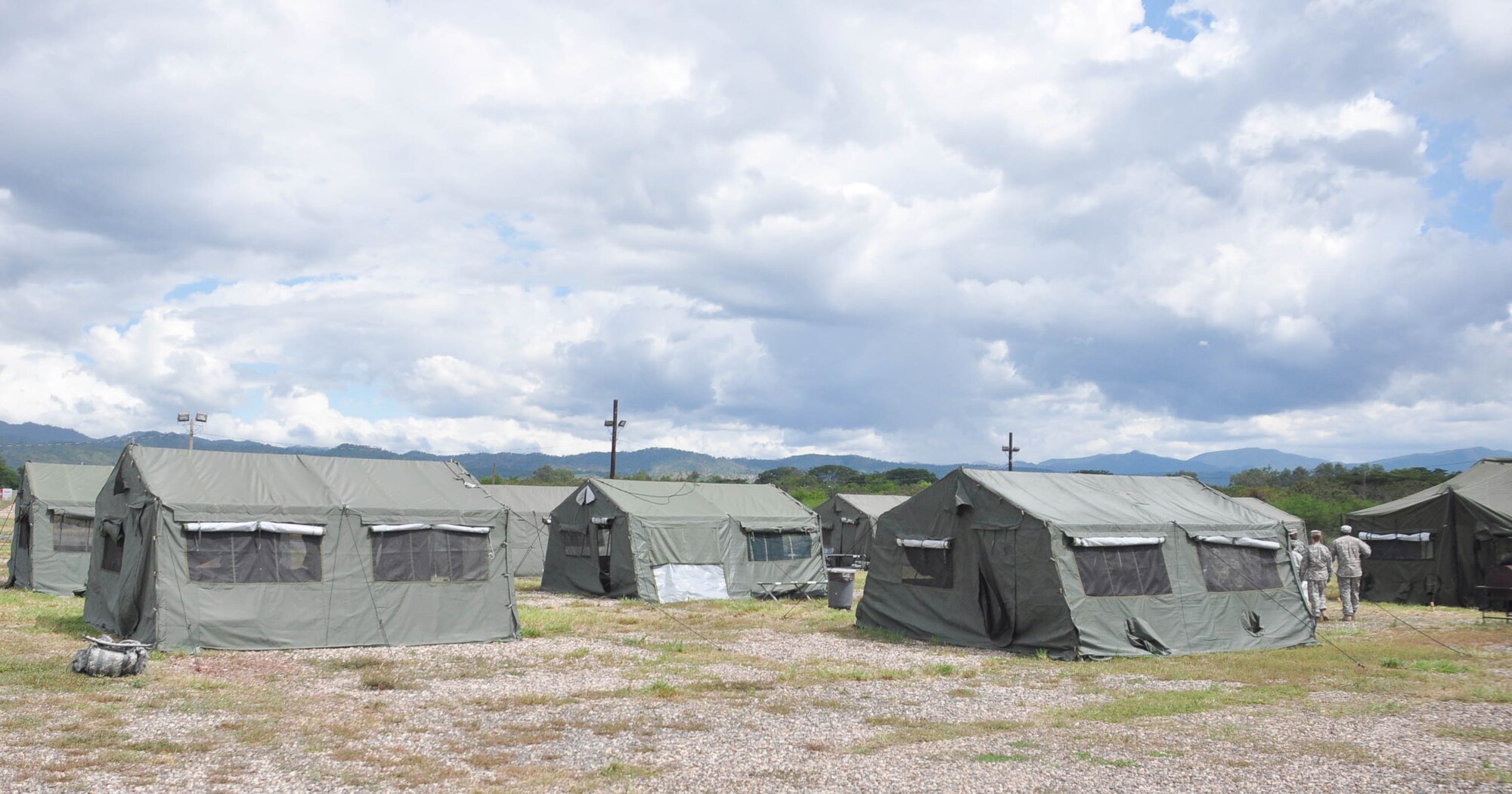 SOTO CANO AIR BASE, Honduras — A view of tent city Oct. 27 behind the base rappelling station. Soldiers from the 1st Battalion, 228th Aviation Regiment recently turned their focus from helicopter operations to some basic Soldier field training from Oct. 25 to 29. Some of the things taught during the training were: practicing recall procedures, setting up tents, radio communications, convoy operations, combat medicine, vehicle staging, wrecker operations, M-249 light machine gun familiarization and firing the M-249 at the range (U.S. Air Force photo/Staff Sgt. Chad Thompson).