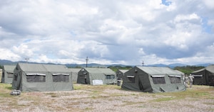 SOTO CANO AIR BASE, Honduras — A view of tent city Oct. 27 behind the base rappelling station. Soldiers from the 1st Battalion, 228th Aviation Regiment recently turned their focus from helicopter operations to some basic Soldier field training from Oct. 25 to 29. Some of the things taught during the training were: practicing recall procedures, setting up tents, radio communications, convoy operations, combat medicine, vehicle staging, wrecker operations, M-249 light machine gun familiarization and firing the M-249 at the range (U.S. Air Force photo/Staff Sgt. Chad Thompson).
