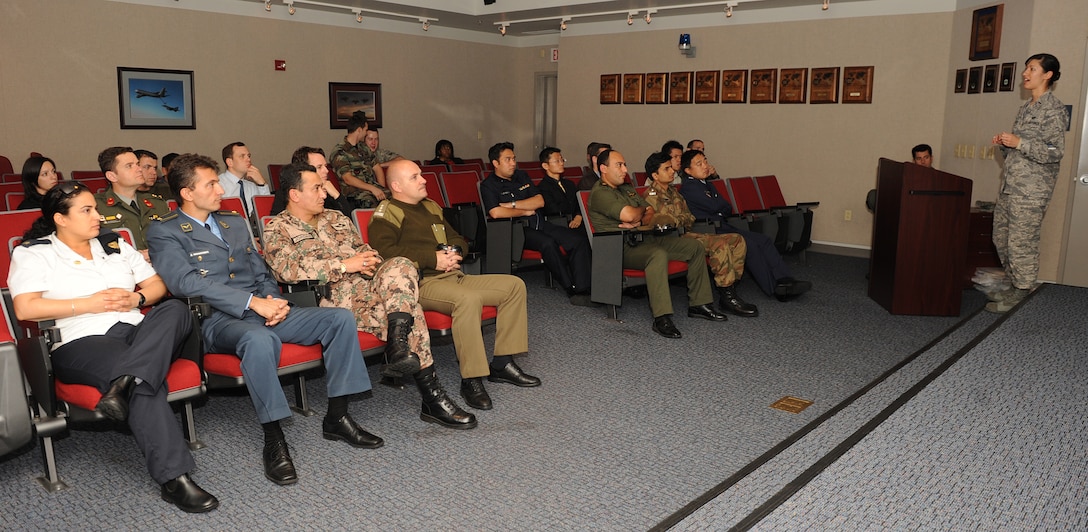 LANGLEY AIR FORCE BASE, Va. -- 1st Lt. Kimberly Templer, 1st Operations Group, briefs multi-national officers during a Combined Strategic Intelligence Training Program here Oct. 28. CSITP offered intelligence professionals from 18 countries an opportunity to learn about the U.S. Government and Air Force intelligence organizations. (U.S. Air Force photo/Airman 1st Class Gul Crockett)
