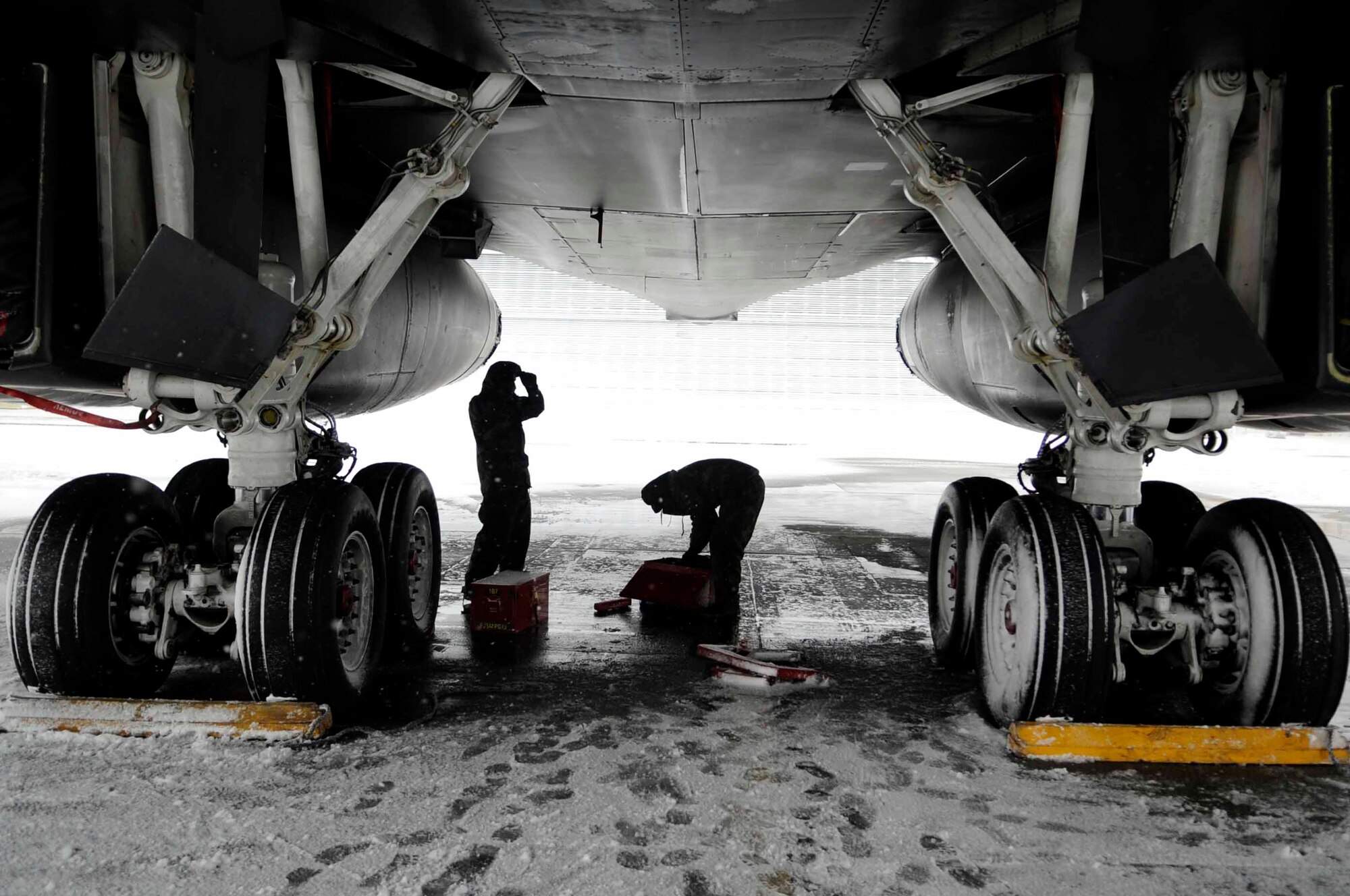 ELLSWORTH AIR FORCE BASE, S.D.--Members of the 28th Maintenance Group keep B-1B Lancer's functional, Oct. 29. Despite the extreme cold and large snowfall in the South Dakota climate, Ellsworth maintainers ensure the readiness of the B-1 fleet. (U.S. Air Force photo/Airman 1st Class Corey Hook)